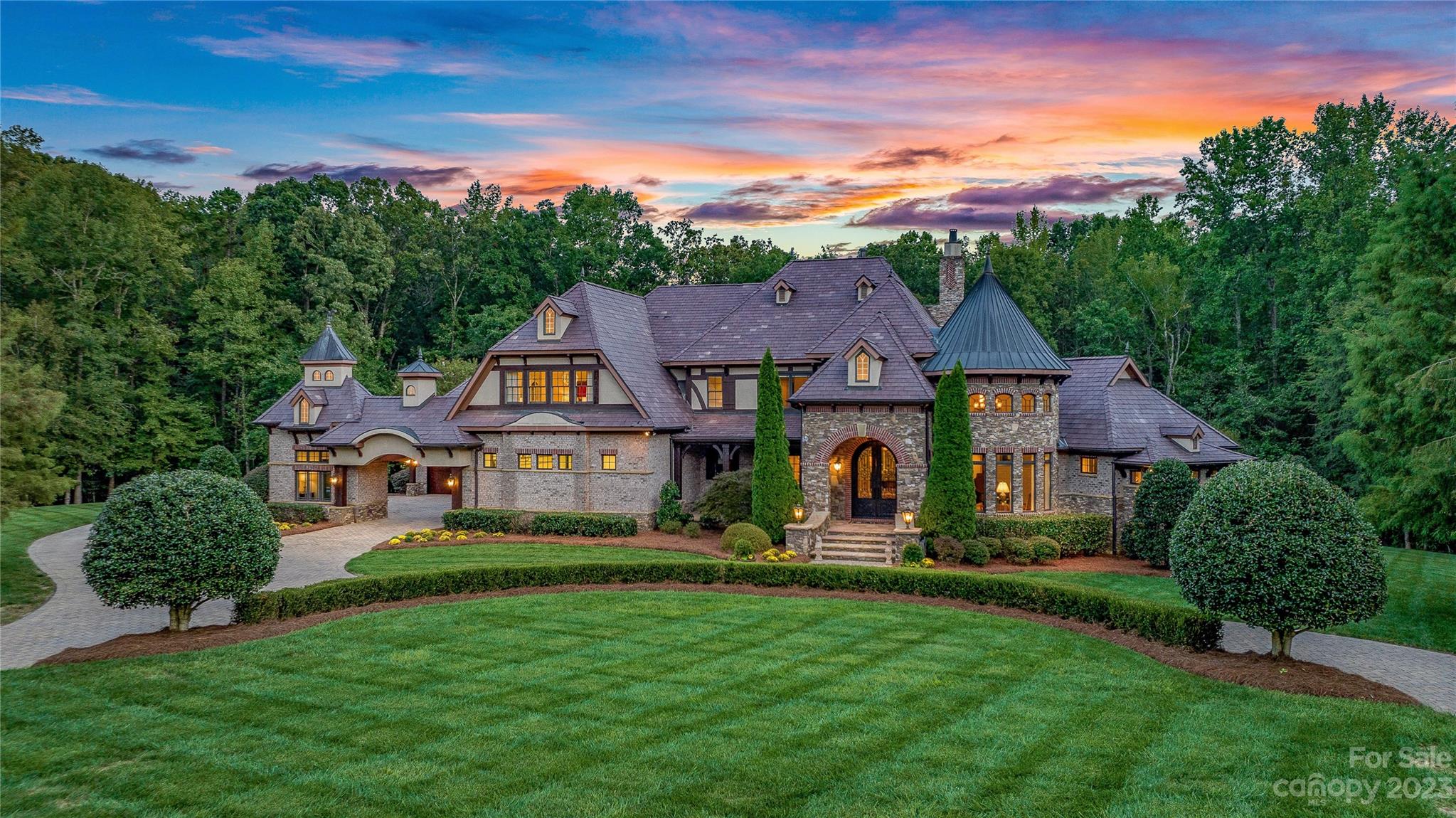 1007 Eirlys Lane Matthews, NC 28104 - Photo 1 of 48 a front view of house with yard and green space