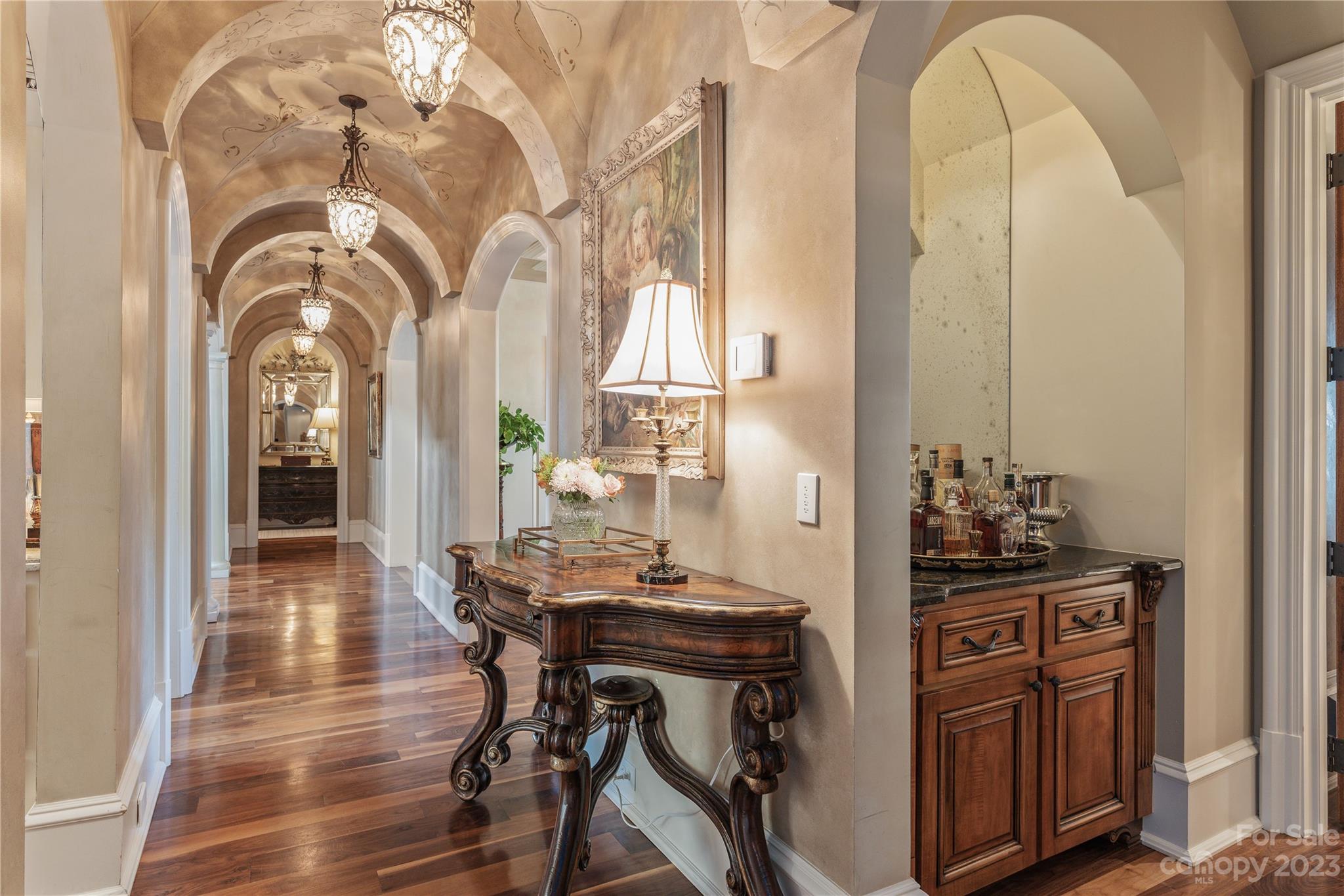 1007 Eirlys Lane Matthews, NC 28104 - Photo 16 of 48 a view of a dining room with furniture and chandelier