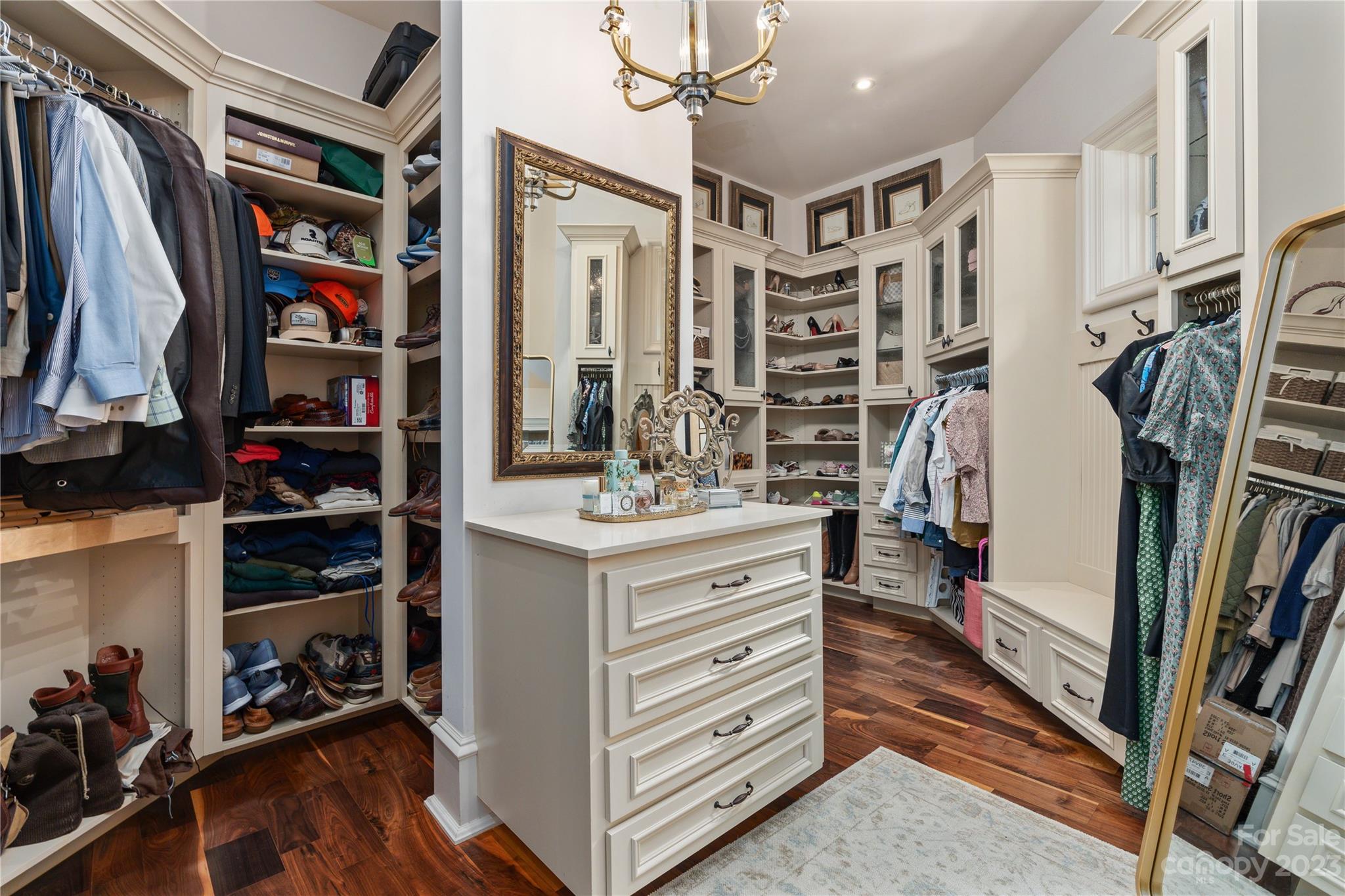 1007 Eirlys Lane Matthews, NC 28104 - Photo 21 of 48 a view of walk in closet with clothes and shoes