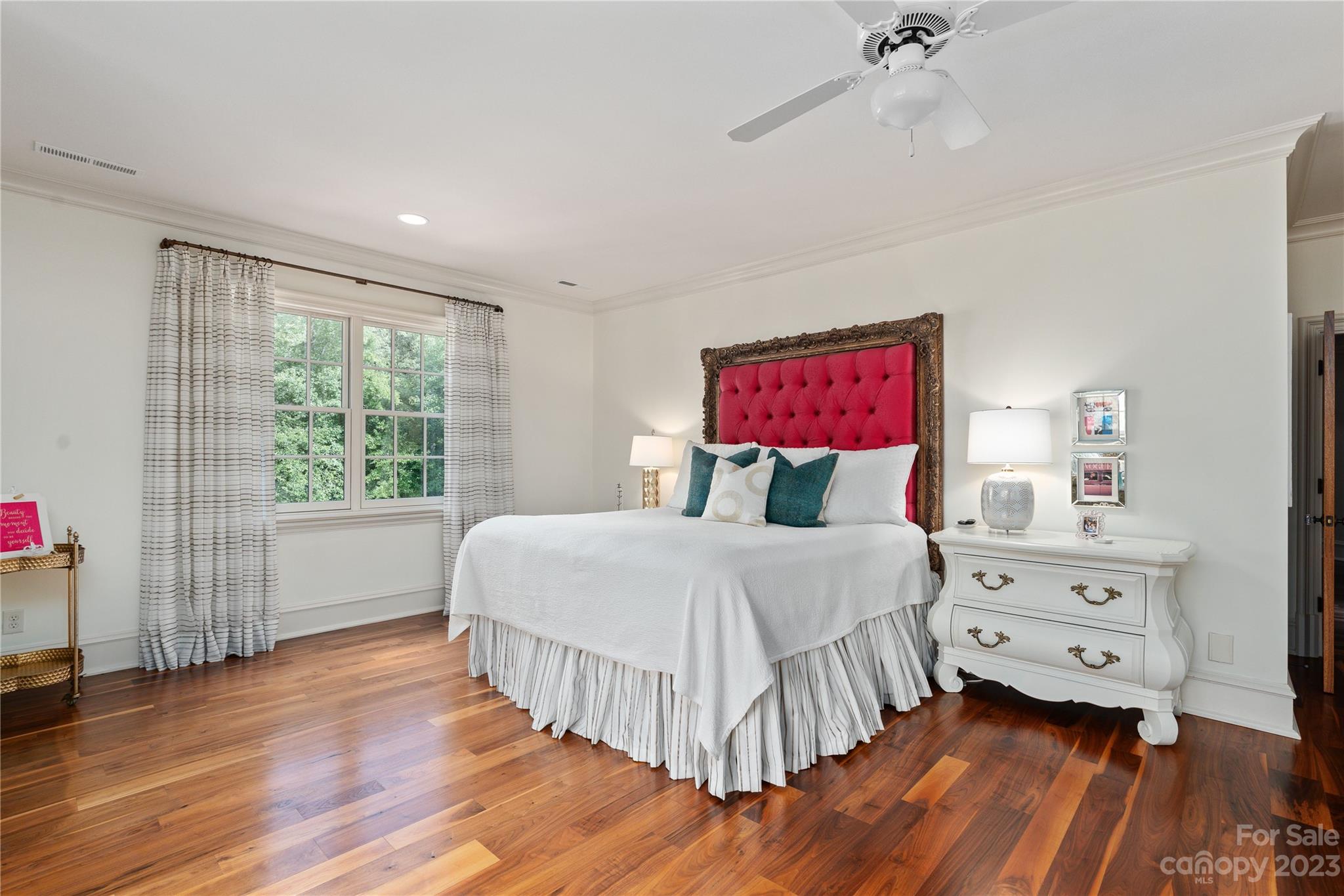 1007 Eirlys Lane Matthews, NC 28104 - Photo 29 of 48 a bedroom with a bed and a dresser