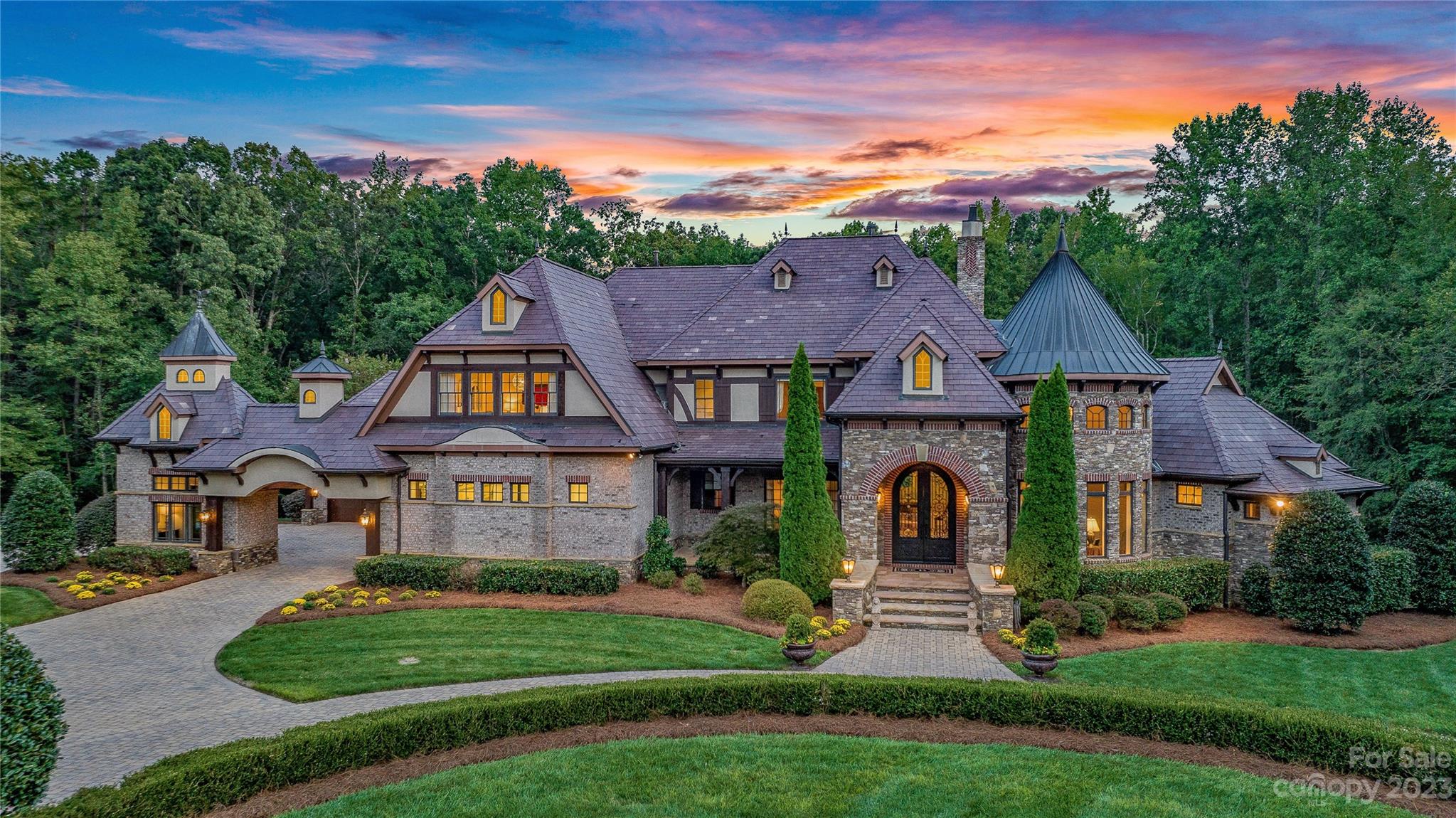 1007 Eirlys Lane Matthews, NC 28104 - Photo 3 of 48 a front view of a house with a yard