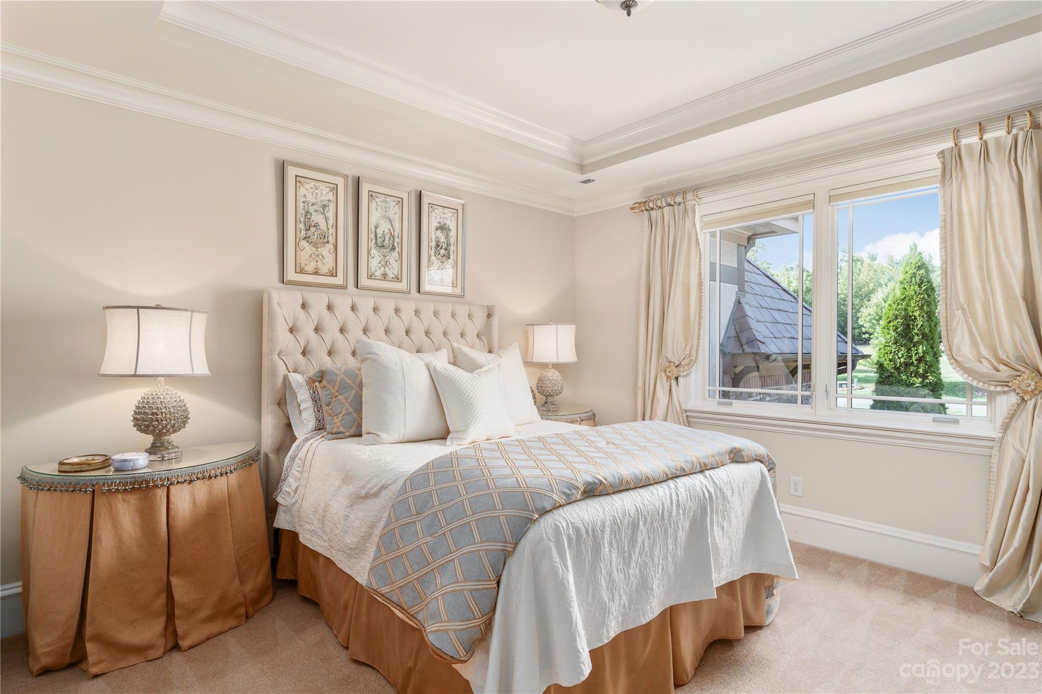 1007 Eirlys Lane Matthews, NC 28104 - Photo 32 of 48 a bedroom with a bed and a window