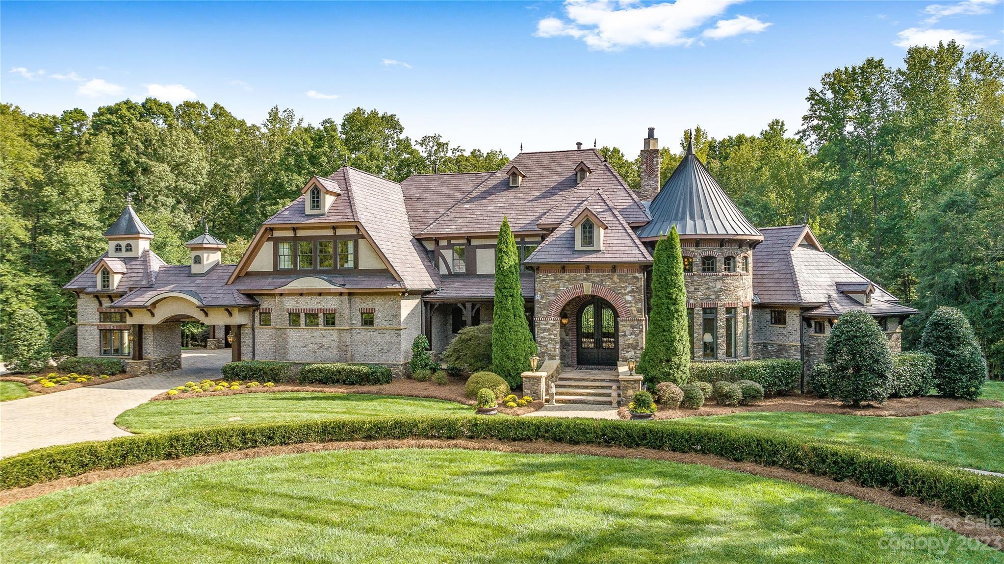 1007 Eirlys Lane Matthews, NC 28104 - Photo 46 of 48 a front view of a house with a yard
