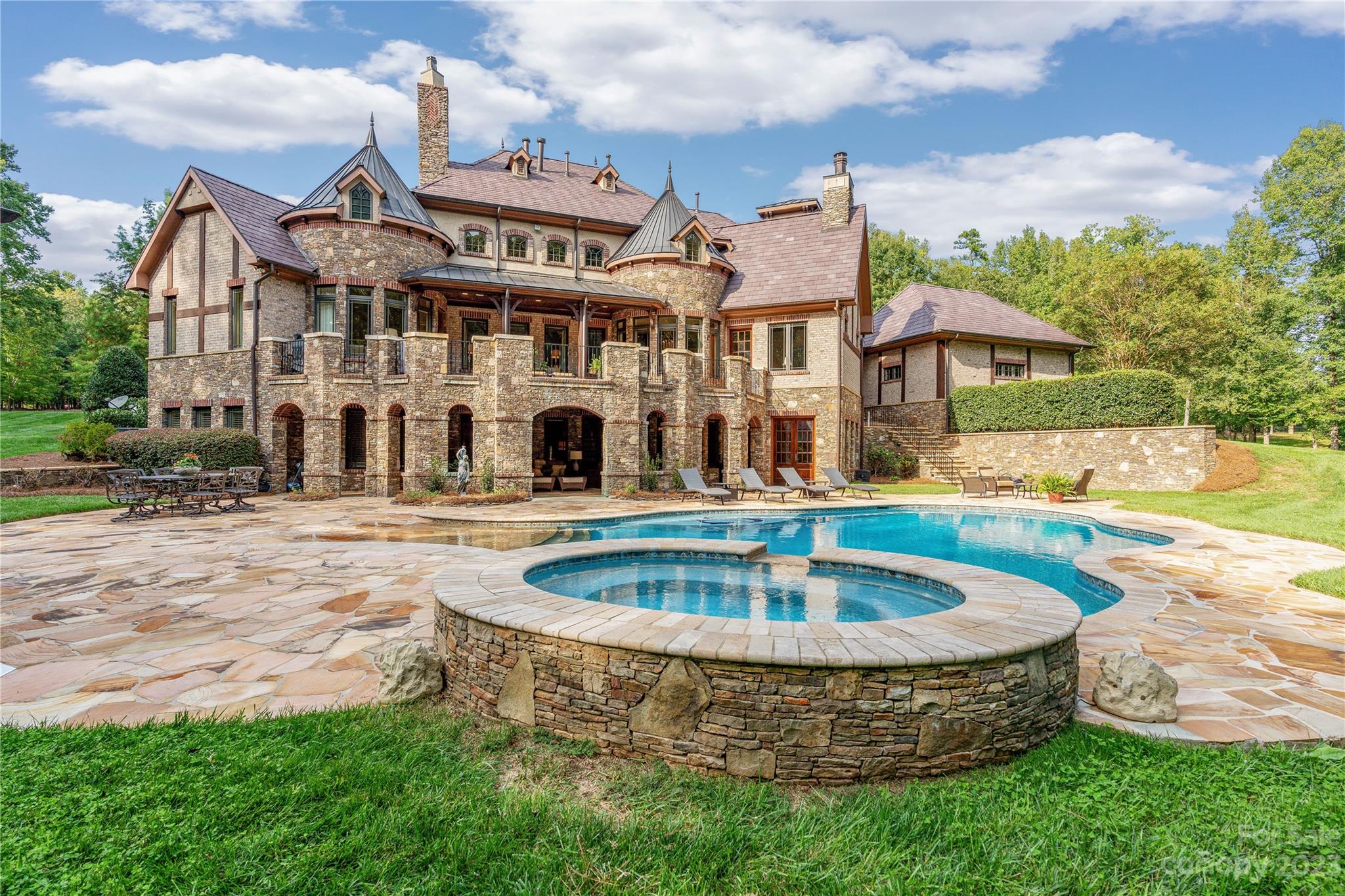 1007 Eirlys Lane Matthews, NC 28104 - Photo 48 of 48 a view of a house with swimming pool