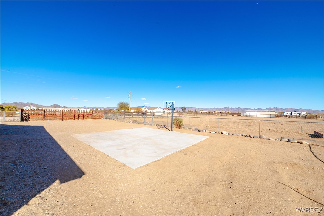 4246 Canelo Road Golden Valley, AZ 86413 - Photo 14 of 54 a view of an outdoor space and a street view