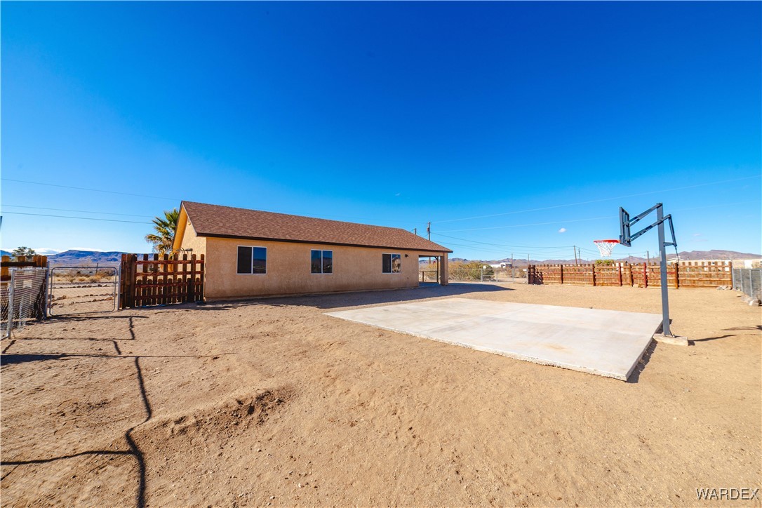 4246 Canelo Road Golden Valley, AZ 86413 - Photo 17 of 54 a view of a house with a snow