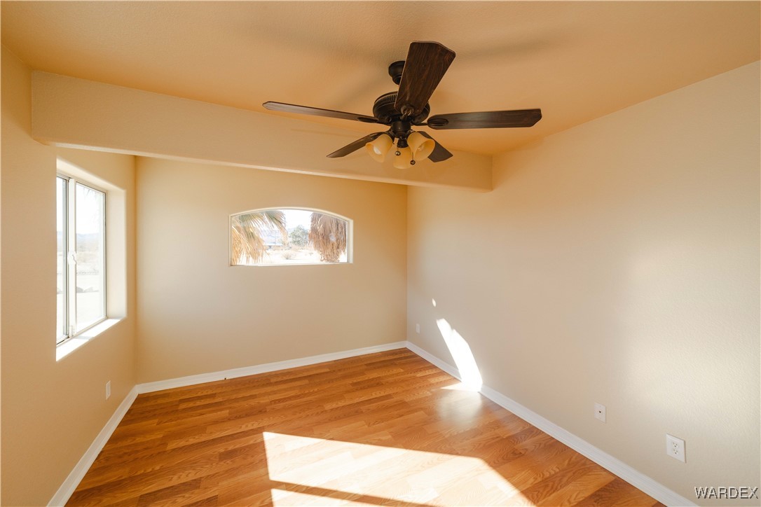 4246 Canelo Road Golden Valley, AZ 86413 - Photo 24 of 54 a view of a room with a dishwasher and a window