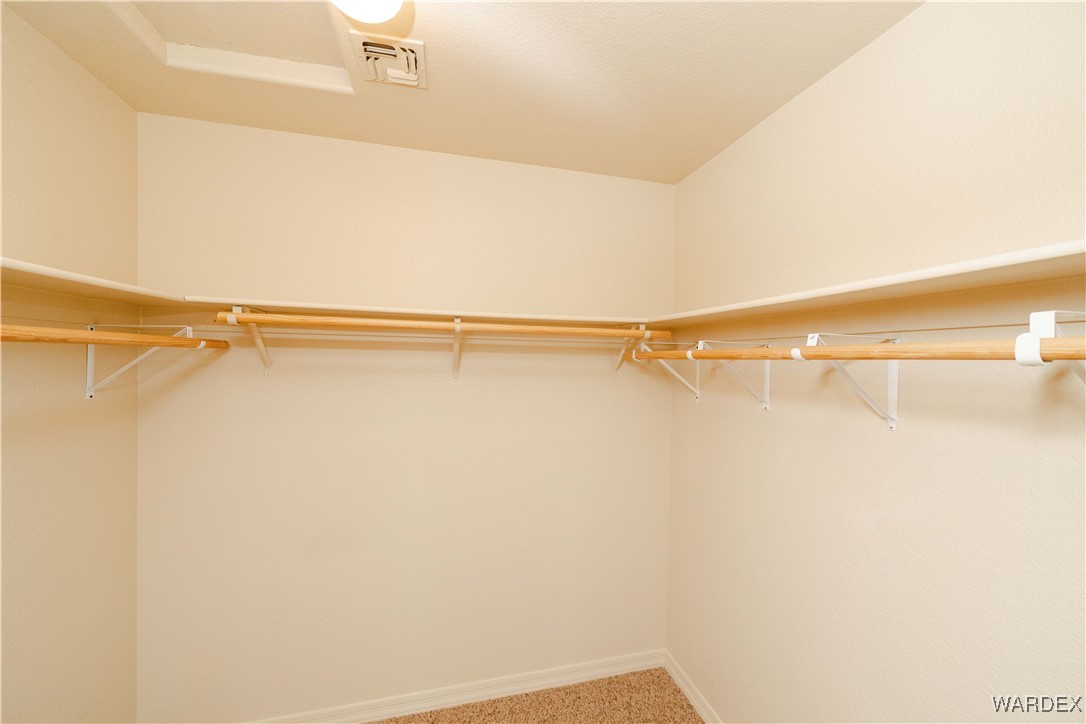 4246 Canelo Road Golden Valley, AZ 86413 - Photo 26 of 54 a view of a room with racks on the wall