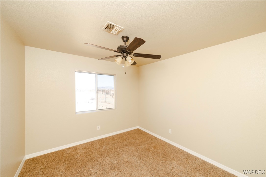 4246 Canelo Road Golden Valley, AZ 86413 - Photo 28 of 54 a view of a room with a window