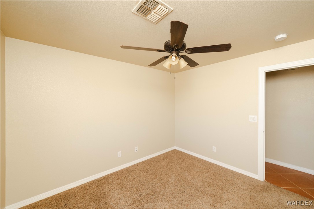 4246 Canelo Road Golden Valley, AZ 86413 - Photo 33 of 54 a view of a small space with a fan