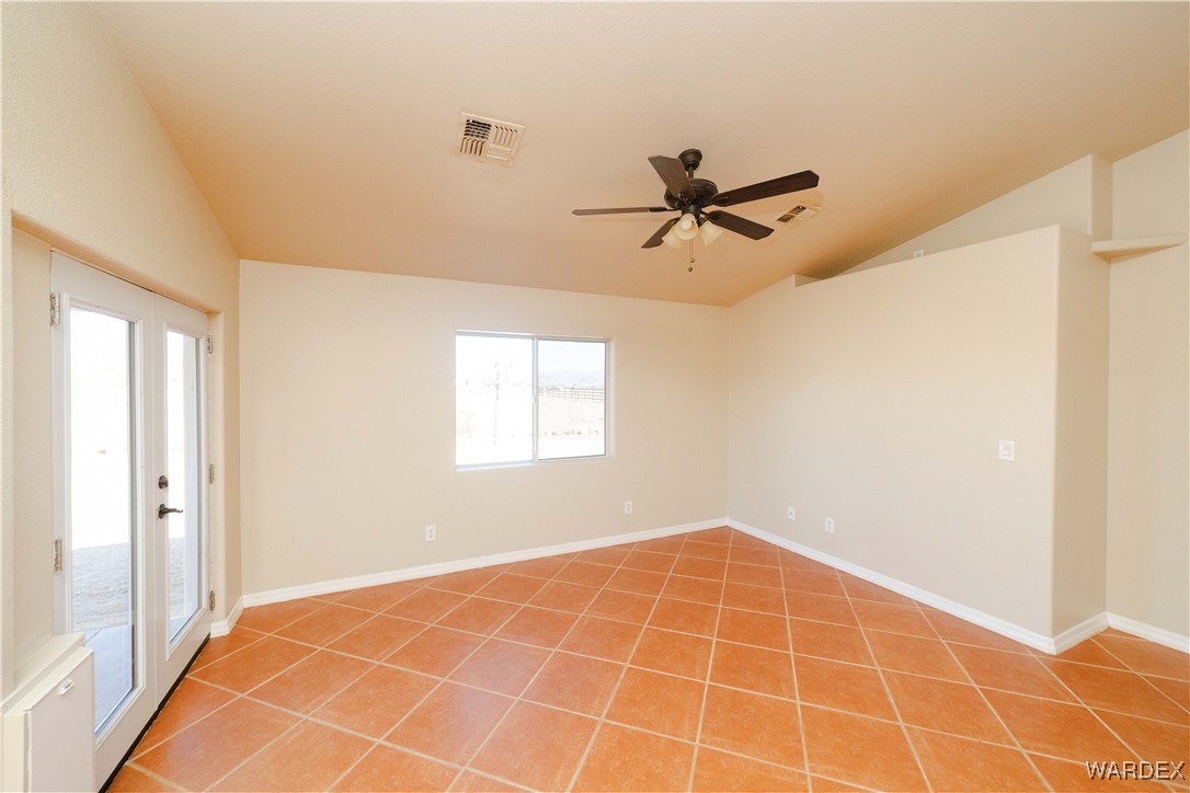 4246 Canelo Road Golden Valley, AZ 86413 - Photo 35 of 54 a view of an empty room with a window