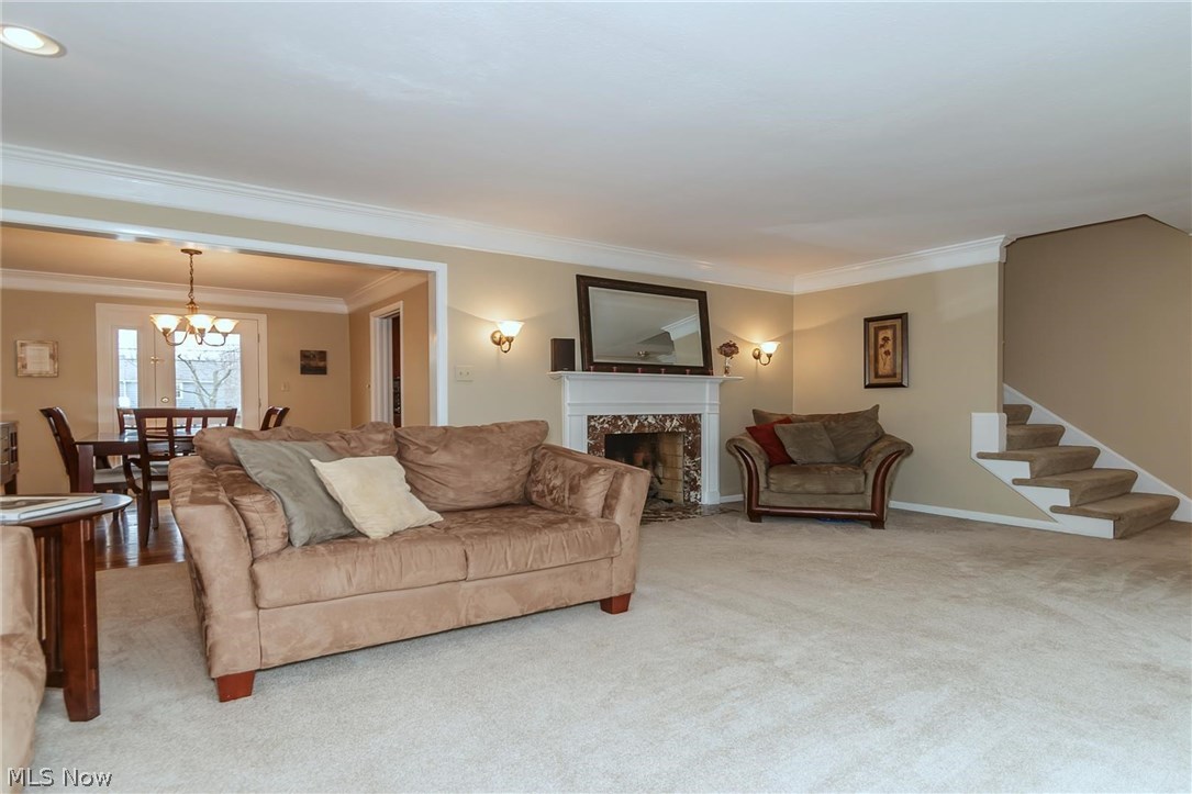 1143 Brainard Road Lyndhurst, OH 44124 - Photo 3 of 35 Living room with double crown molding and gas fireplace for those chilly evenings.