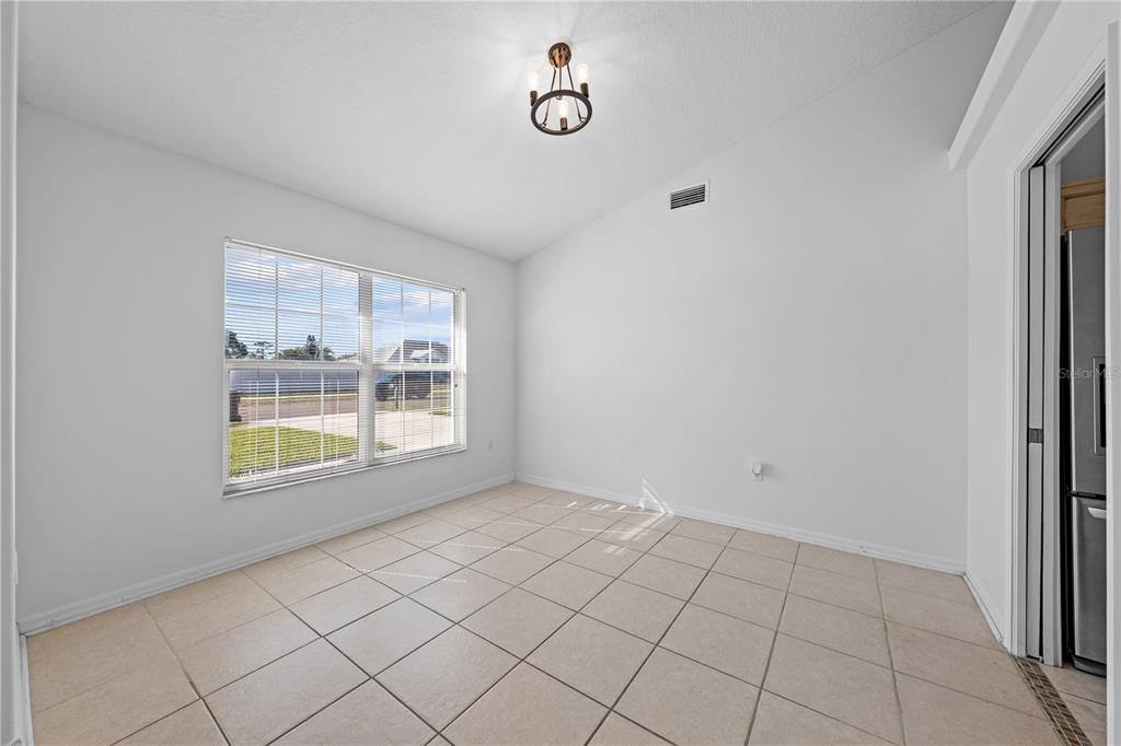 2708 Kayak Court St. Cloud, FL 34772 - Photo 29 of 56 a view of an empty room with a window