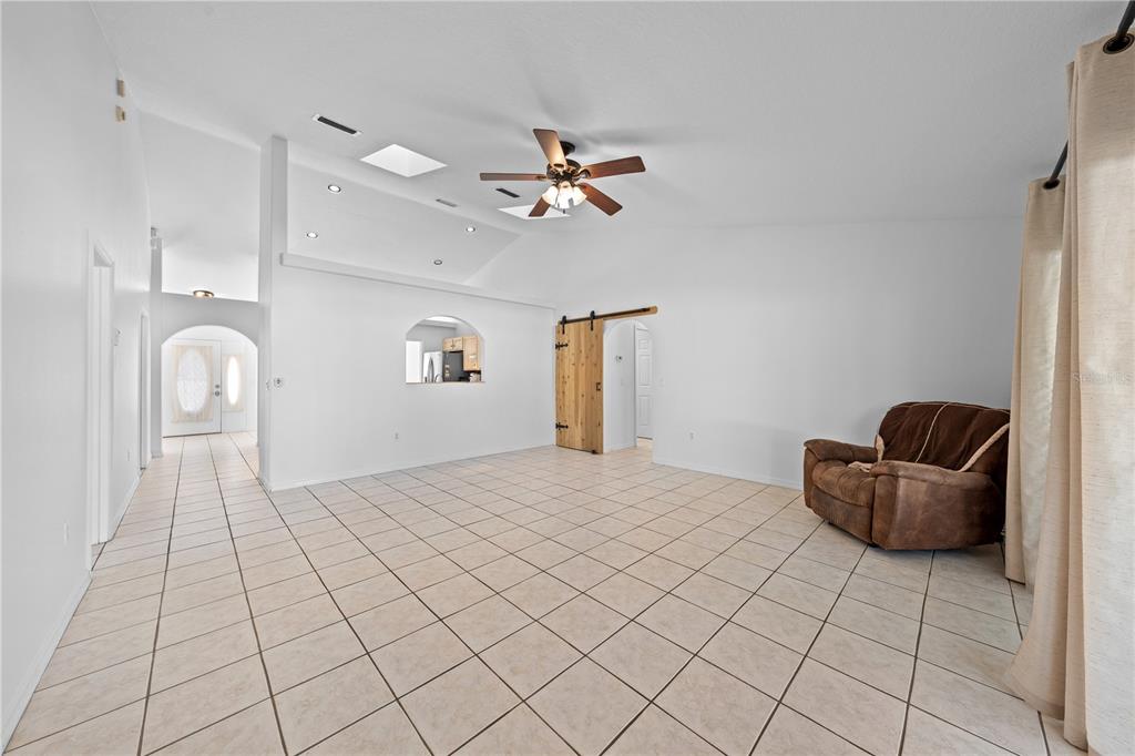 2708 Kayak Court St. Cloud, FL 34772 - Photo 33 of 56 a living room with furniture and a table