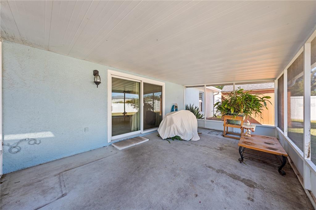 2708 Kayak Court St. Cloud, FL 34772 - Photo 44 of 56 a living room with furniture and a large window