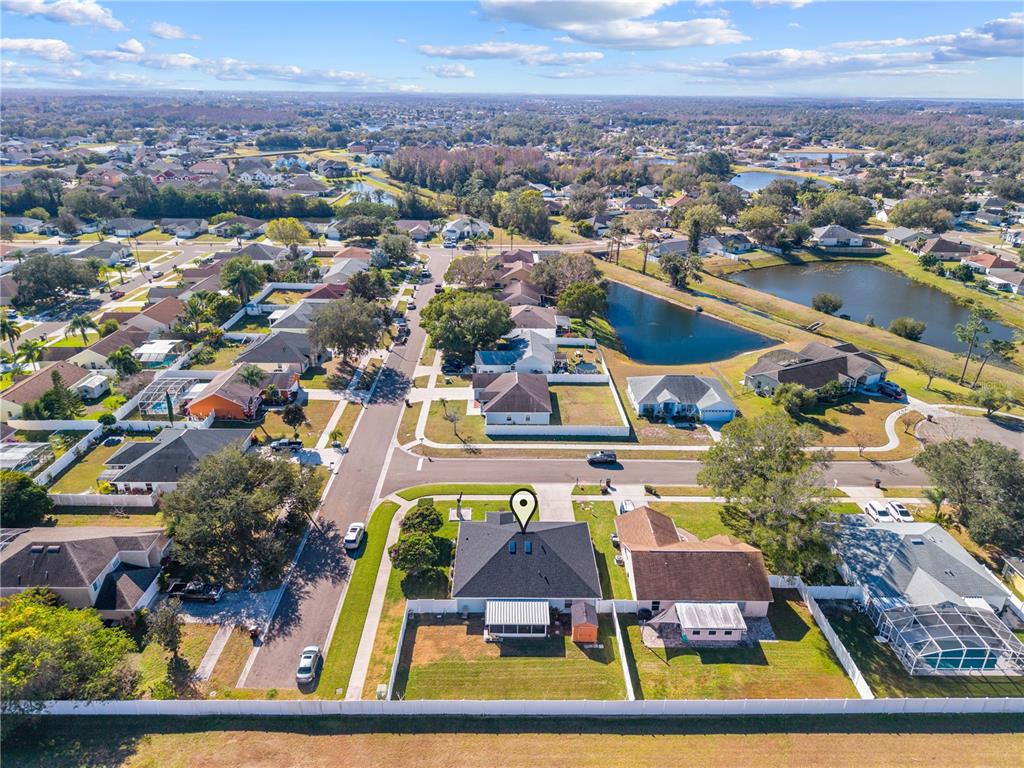 2708 Kayak Court St. Cloud, FL 34772 - Photo 52 of 56 an aerial view of residential houses with outdoor space