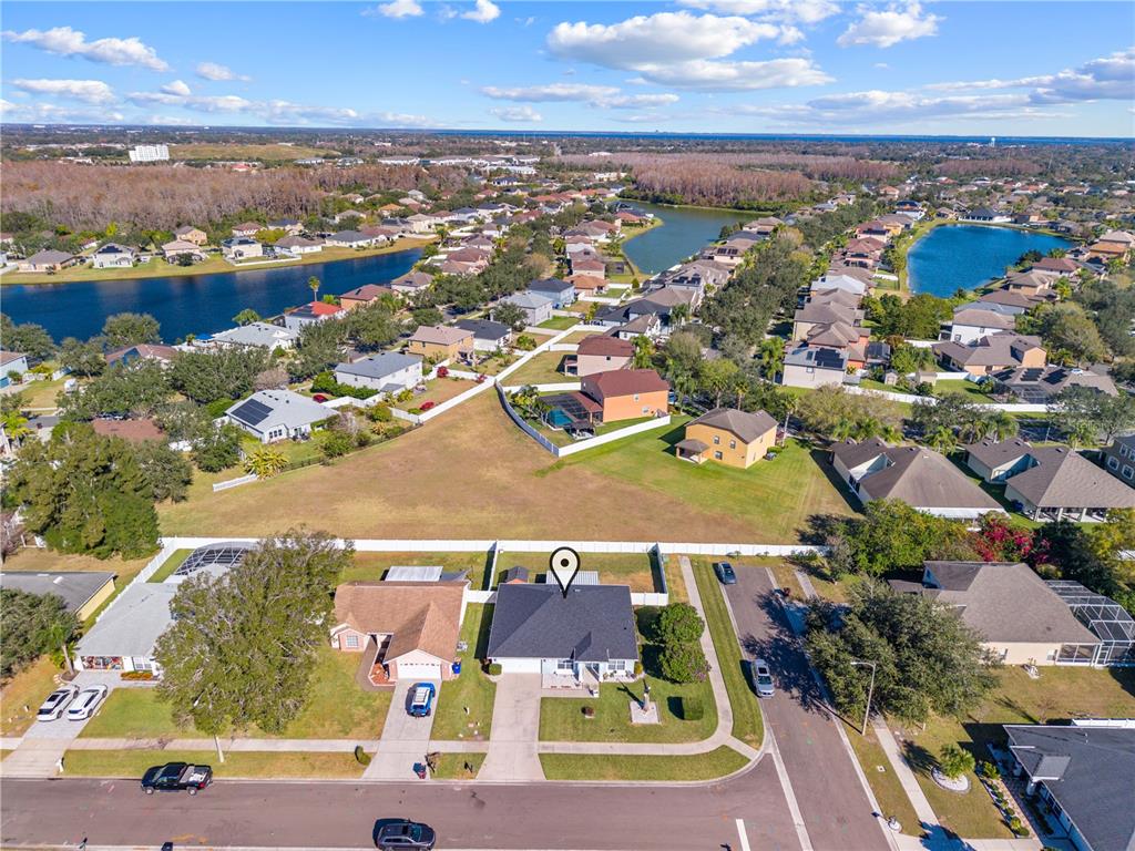 2708 Kayak Court St. Cloud, FL 34772 - Photo 54 of 56 an aerial view of residential houses with outdoor space