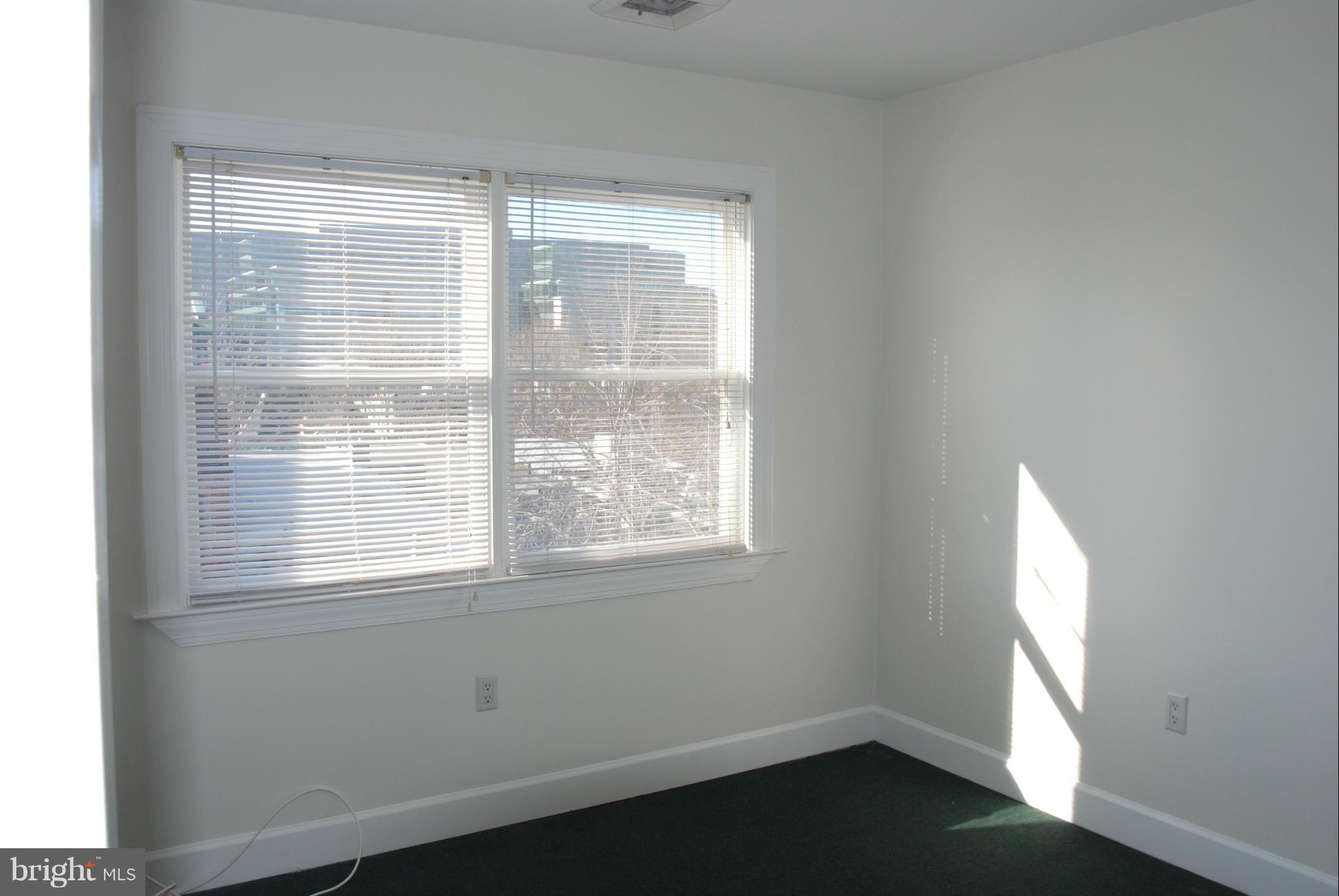 316 F Street Northeast, Unit 1 Washington, DC 20002 - Photo 8 of 18 a view of an empty room with a window