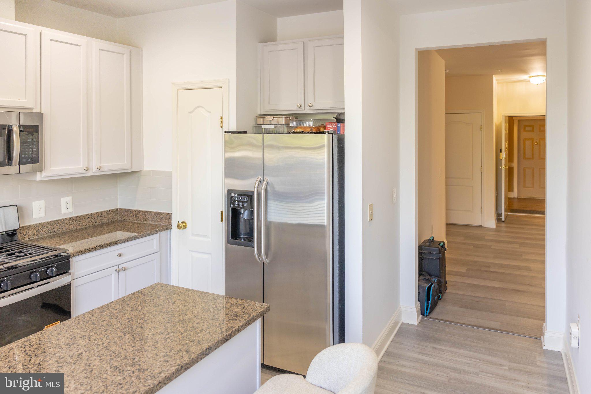 12824 Clarksburg Square Road, Unit 105 Clarksburg, MD 20871 - Photo 41 of 96 Modern kitchen with sleek finishes.