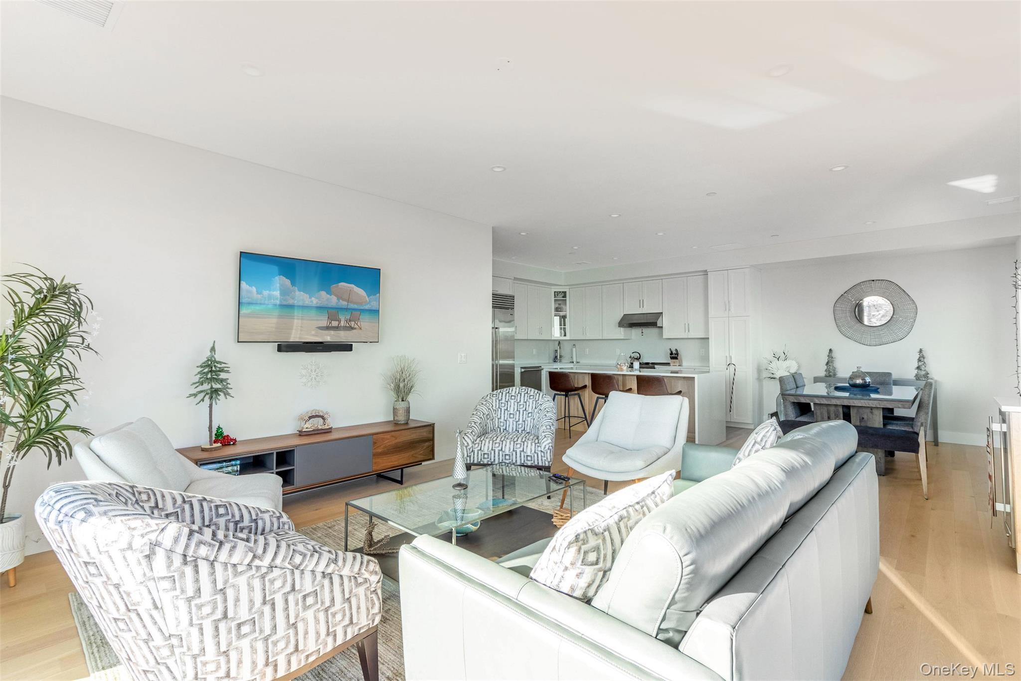 123 Sterling Avenue, Unit 12 Greenport, NY 11944 - Photo 12 of 29 a living room with furniture