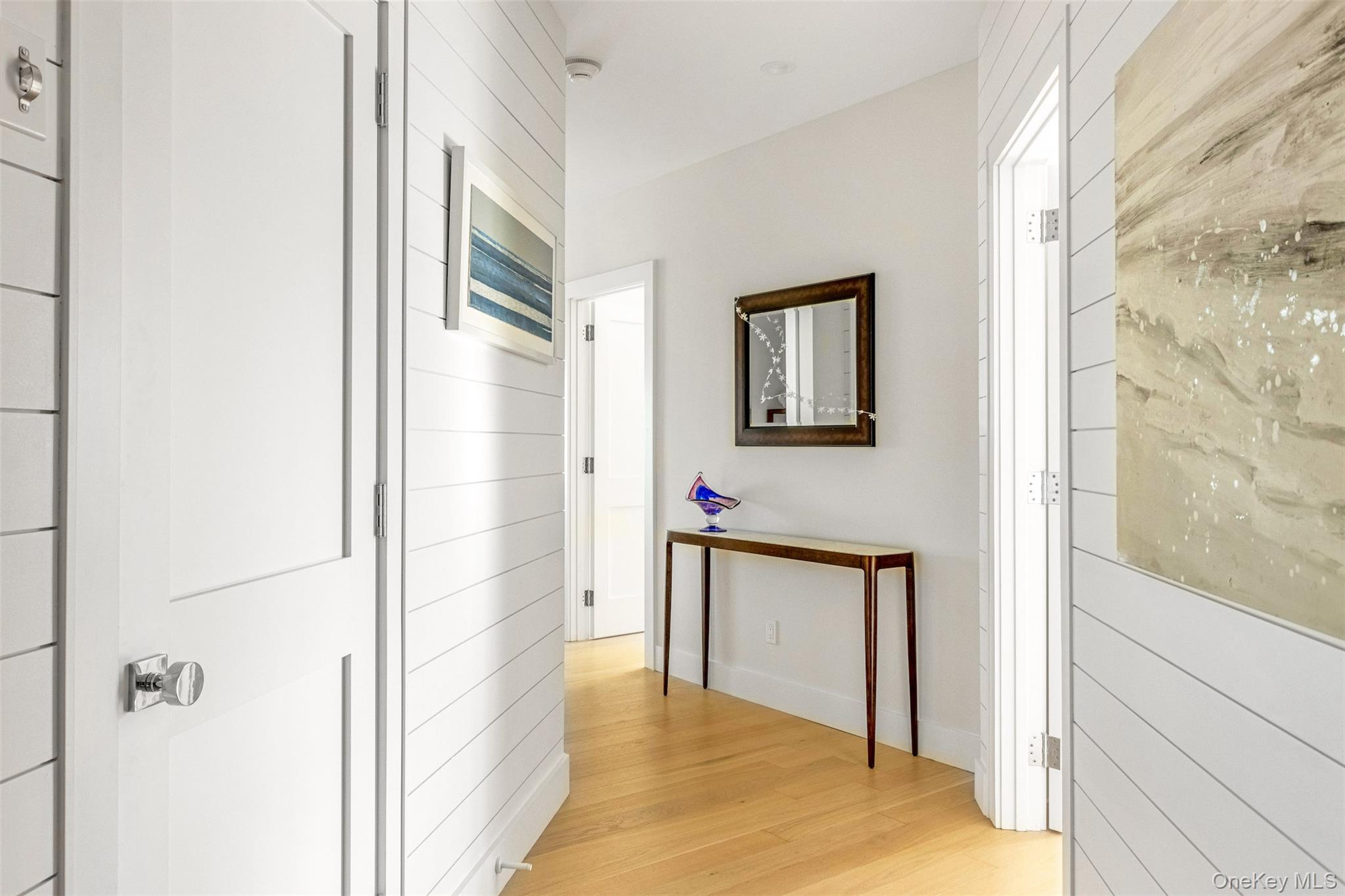 123 Sterling Avenue, Unit 12 Greenport, NY 11944 - Photo 2 of 29 a view of a bathroom from the hallway