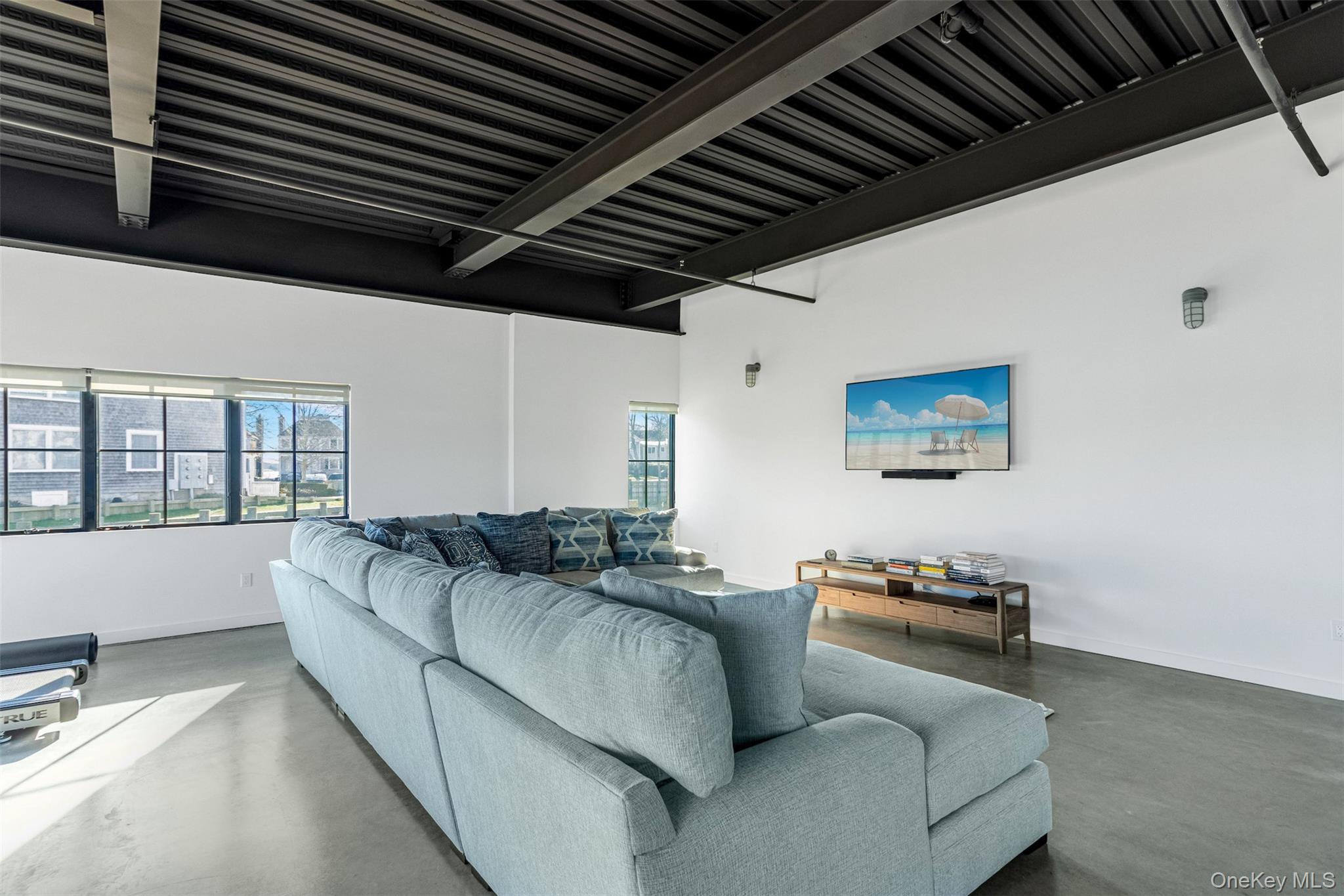 123 Sterling Avenue, Unit 12 Greenport, NY 11944 - Photo 23 of 29 a living room with furniture