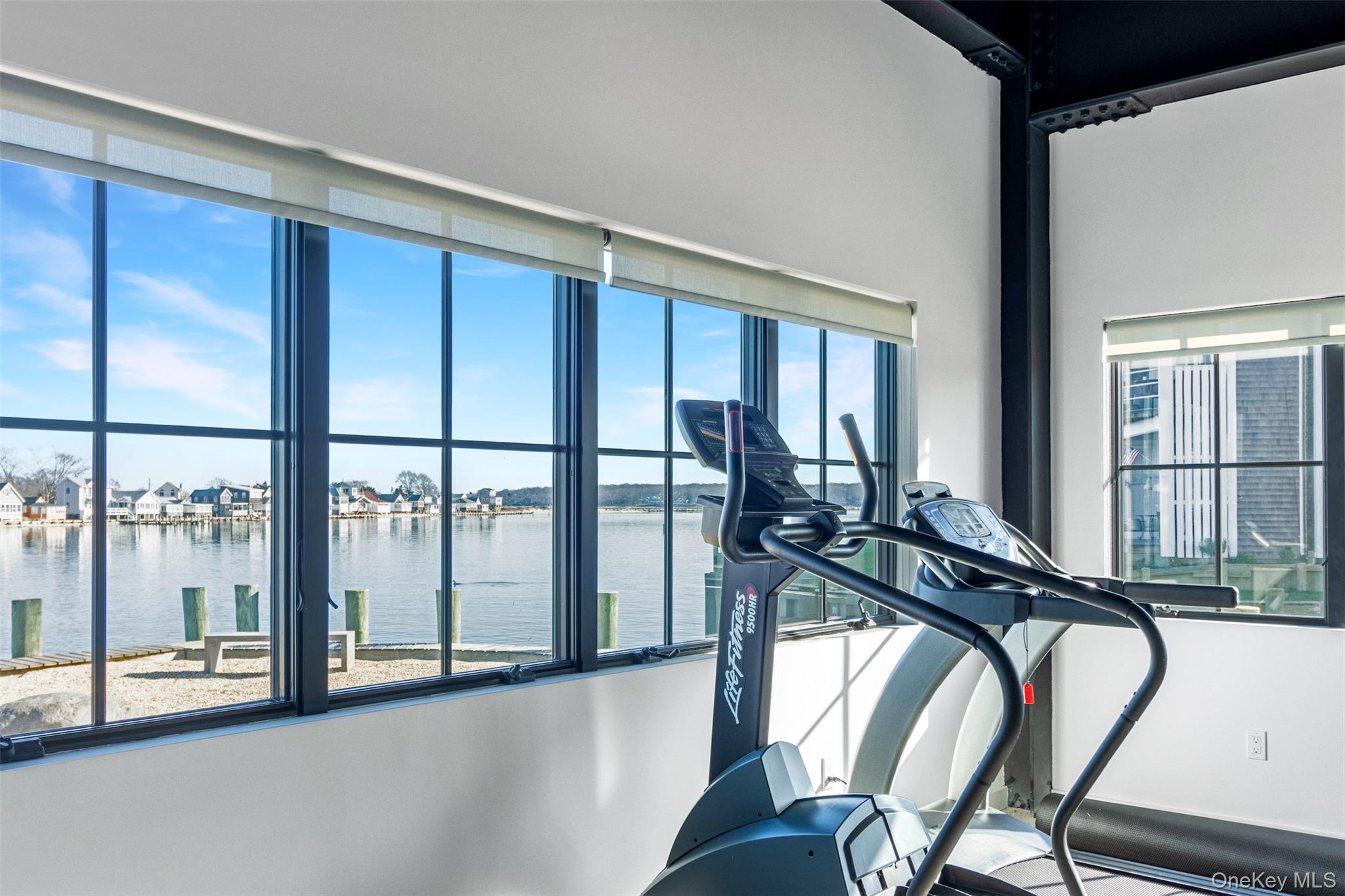 123 Sterling Avenue, Unit 12 Greenport, NY 11944 - Photo 25 of 29 a view of a room with gym equipment