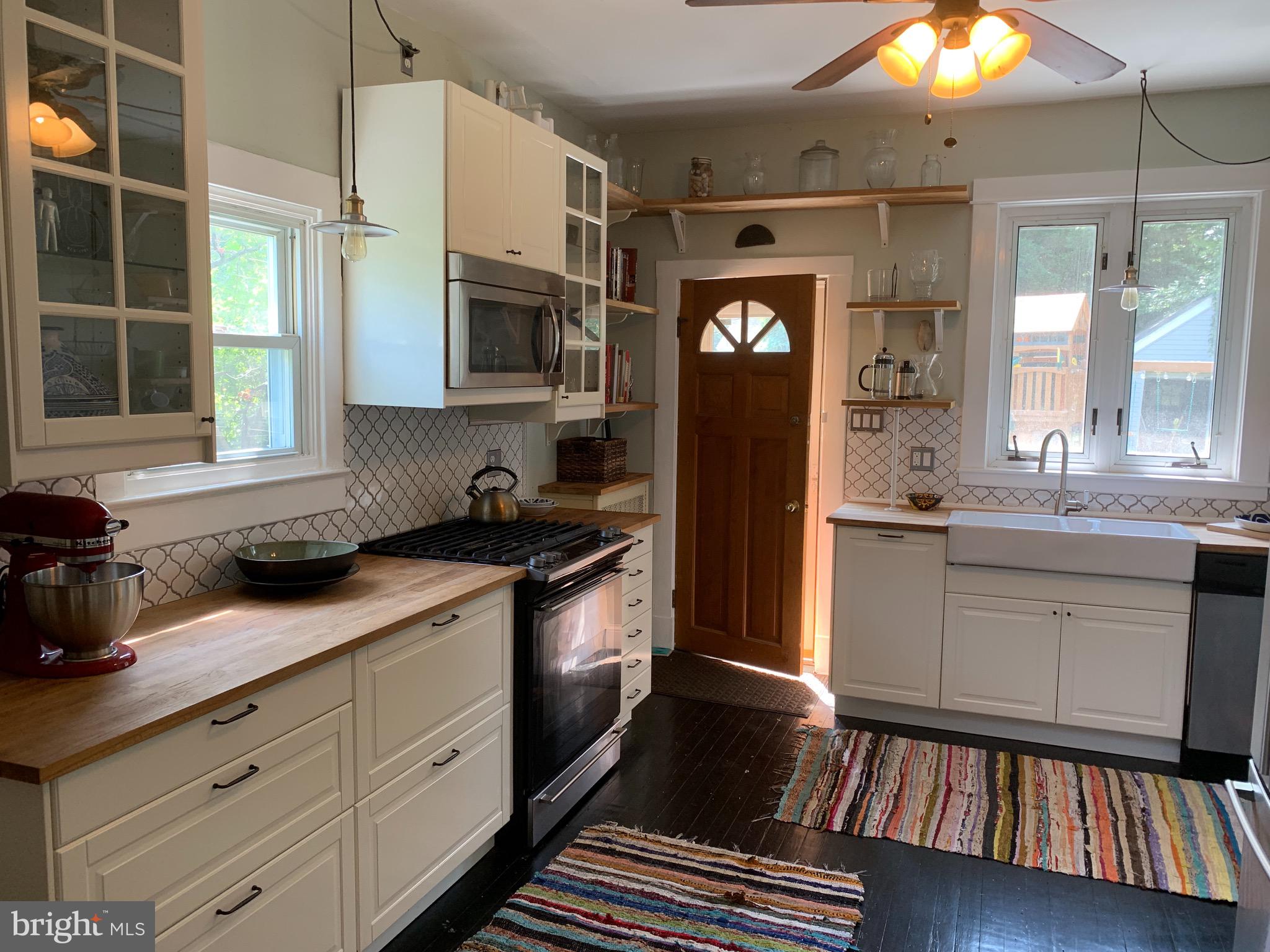 813 Cedarcroft Road Baltimore, MD 21212 - Photo 17 of 43 Painted wood floor adds a rustic feel!
