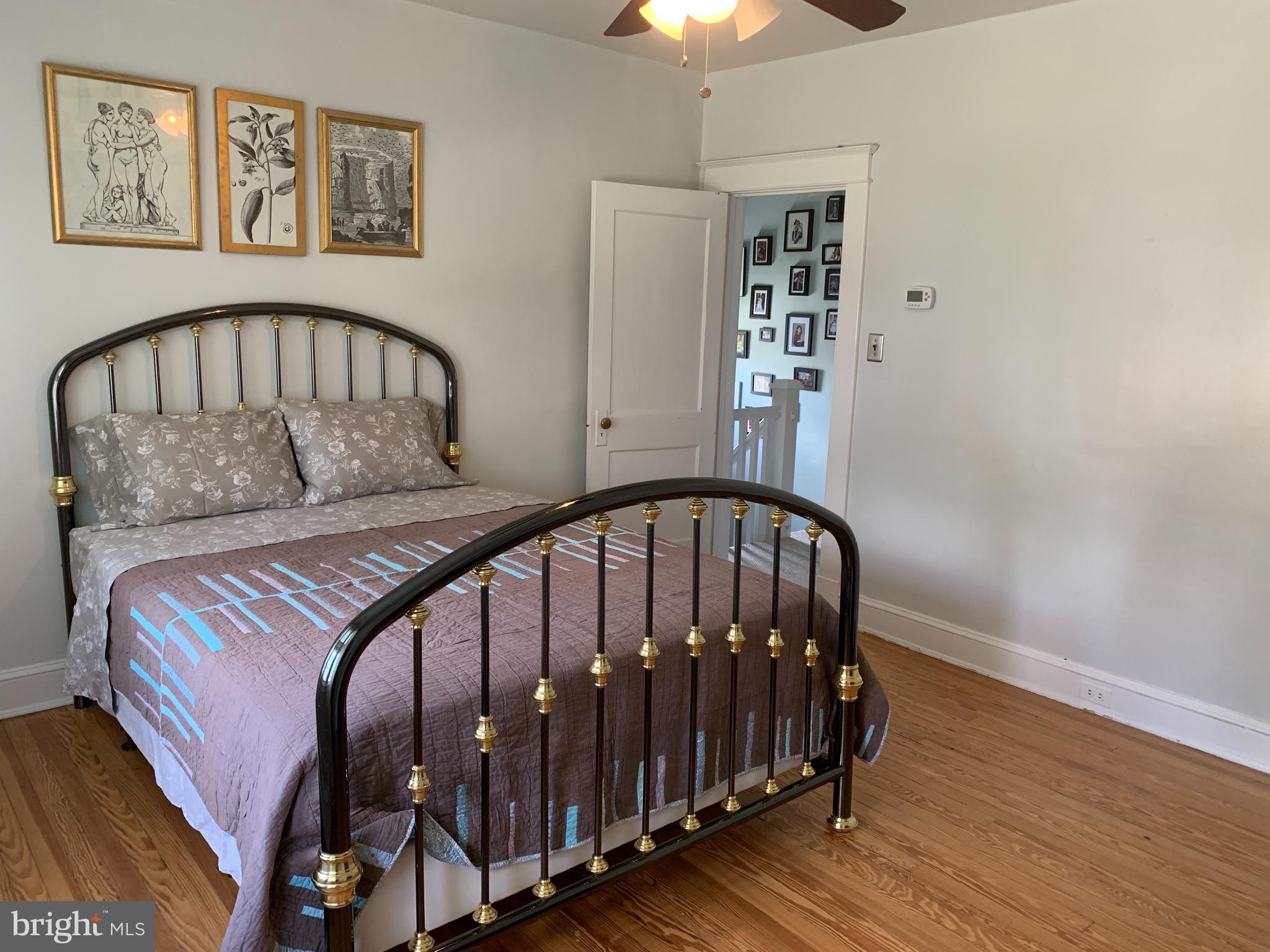 813 Cedarcroft Road Baltimore, MD 21212 - Photo 19 of 43 Neutral walls, wood floors & a ceiling fan!