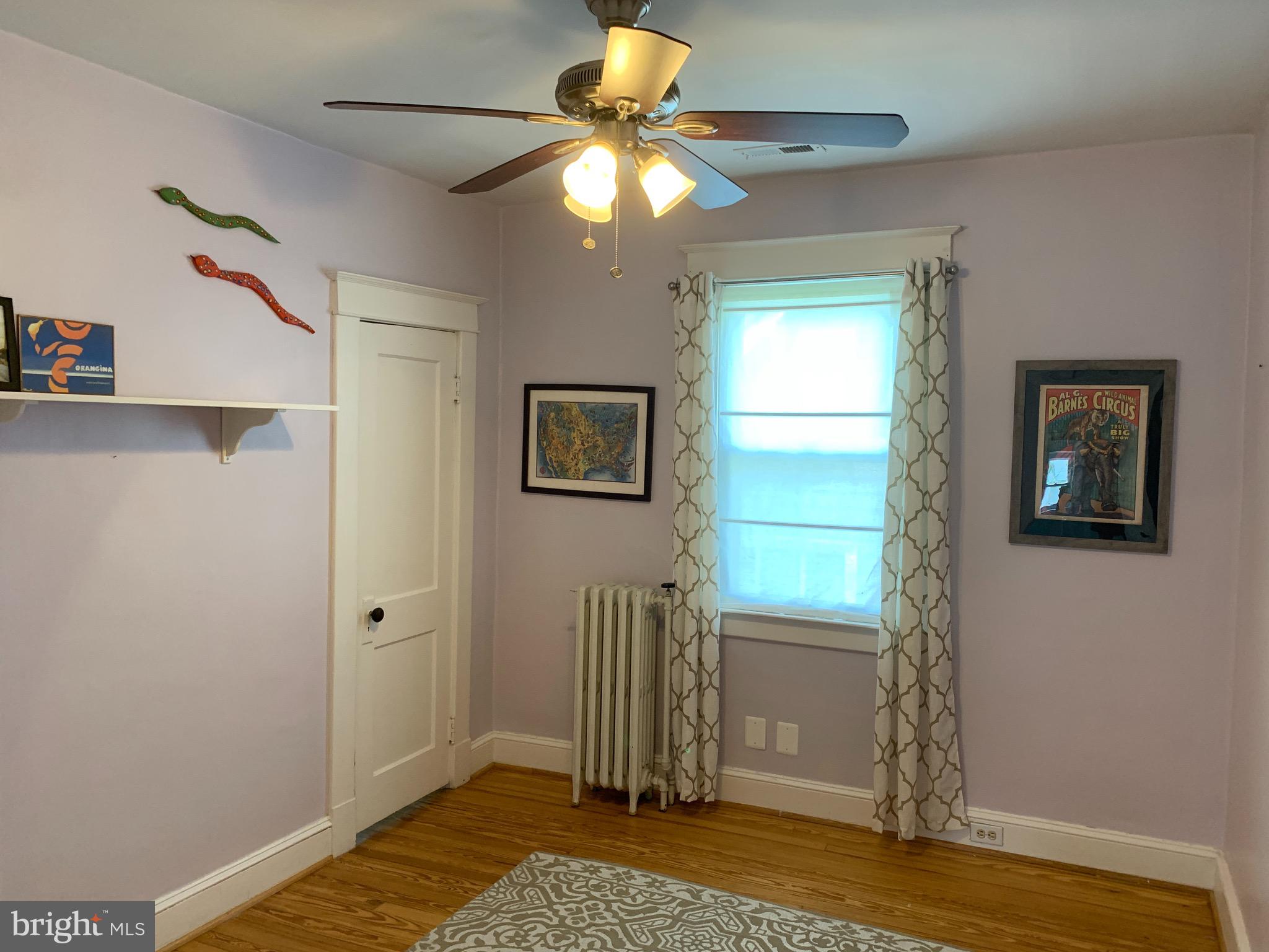 813 Cedarcroft Road Baltimore, MD 21212 - Photo 23 of 43 3rd bedroom with ceiling fan & wood floors!