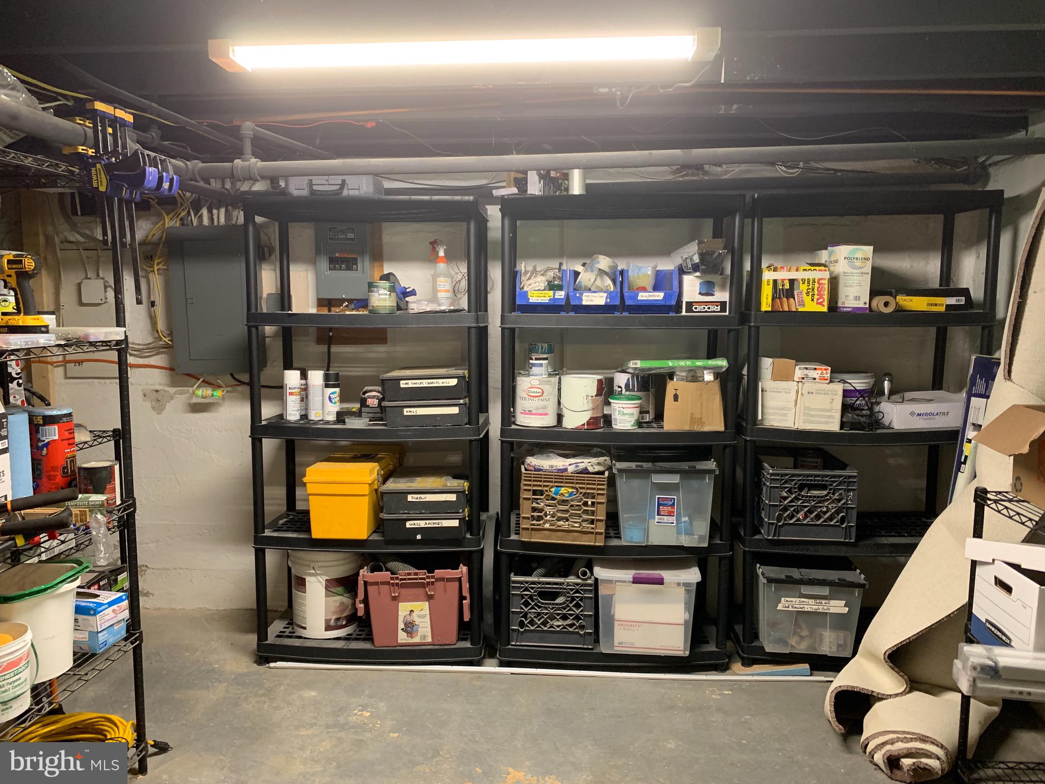 813 Cedarcroft Road Baltimore, MD 21212 - Photo 37 of 43 Workshop with shelving helps with organization!