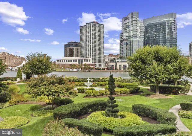 a view of a city with tall buildings