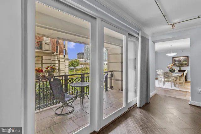 a view of a balcony with chairs