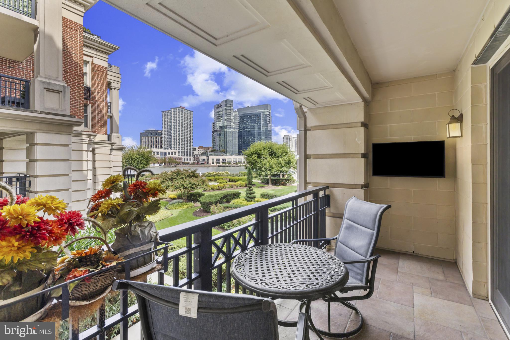 801 Key Highway, Unit 251 Baltimore, MD 21230 - Photo 25 of 57 a view of a balcony with chairs
