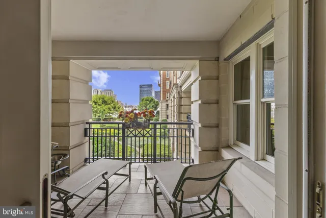 a bathroom with a tub sink shower and mirror