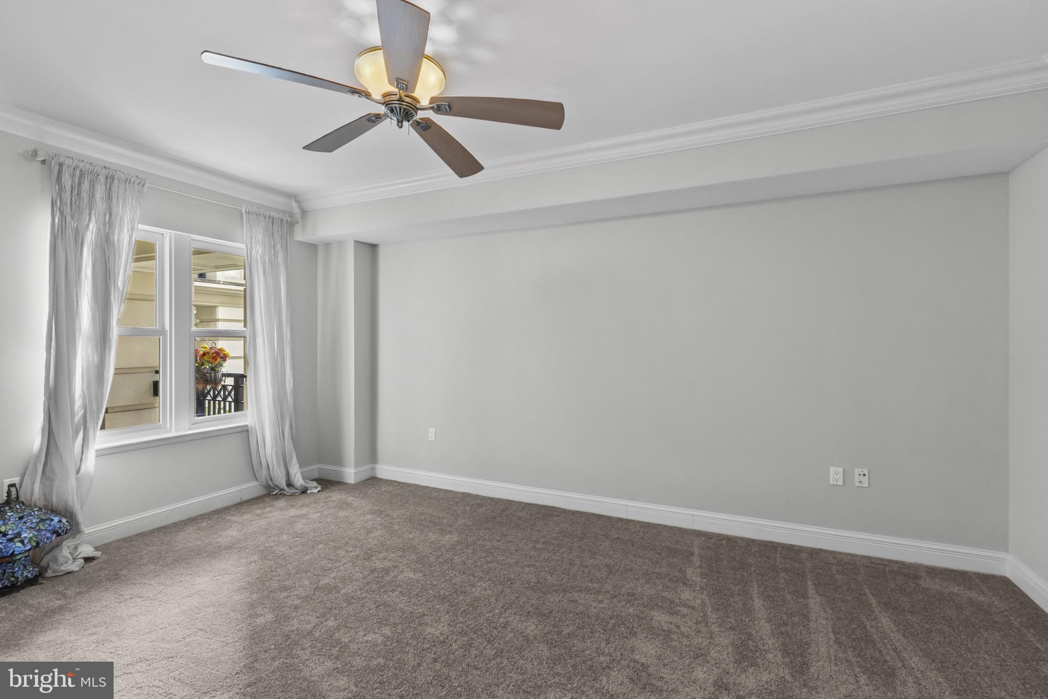 801 Key Highway, Unit 251 Baltimore, MD 21230 - Photo 37 of 57 a view of an empty room with a window