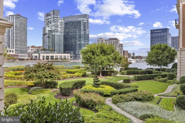 a dining room with a table and chairs
