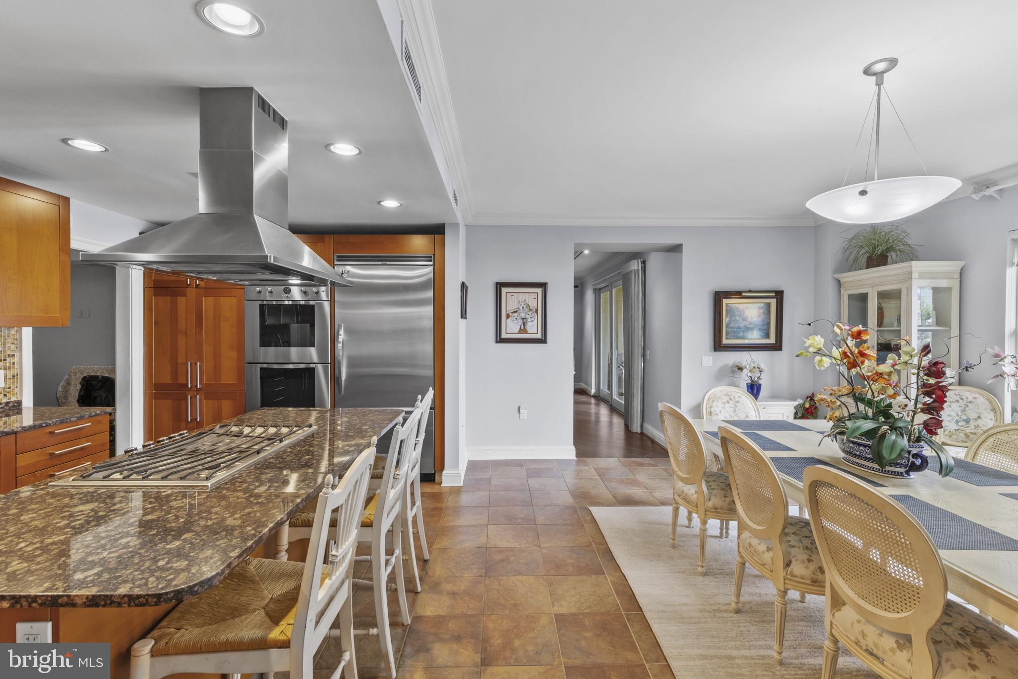 801 Key Highway, Unit 251 Baltimore, MD 21230 - Photo 9 of 57 a view of a dining room with furniture