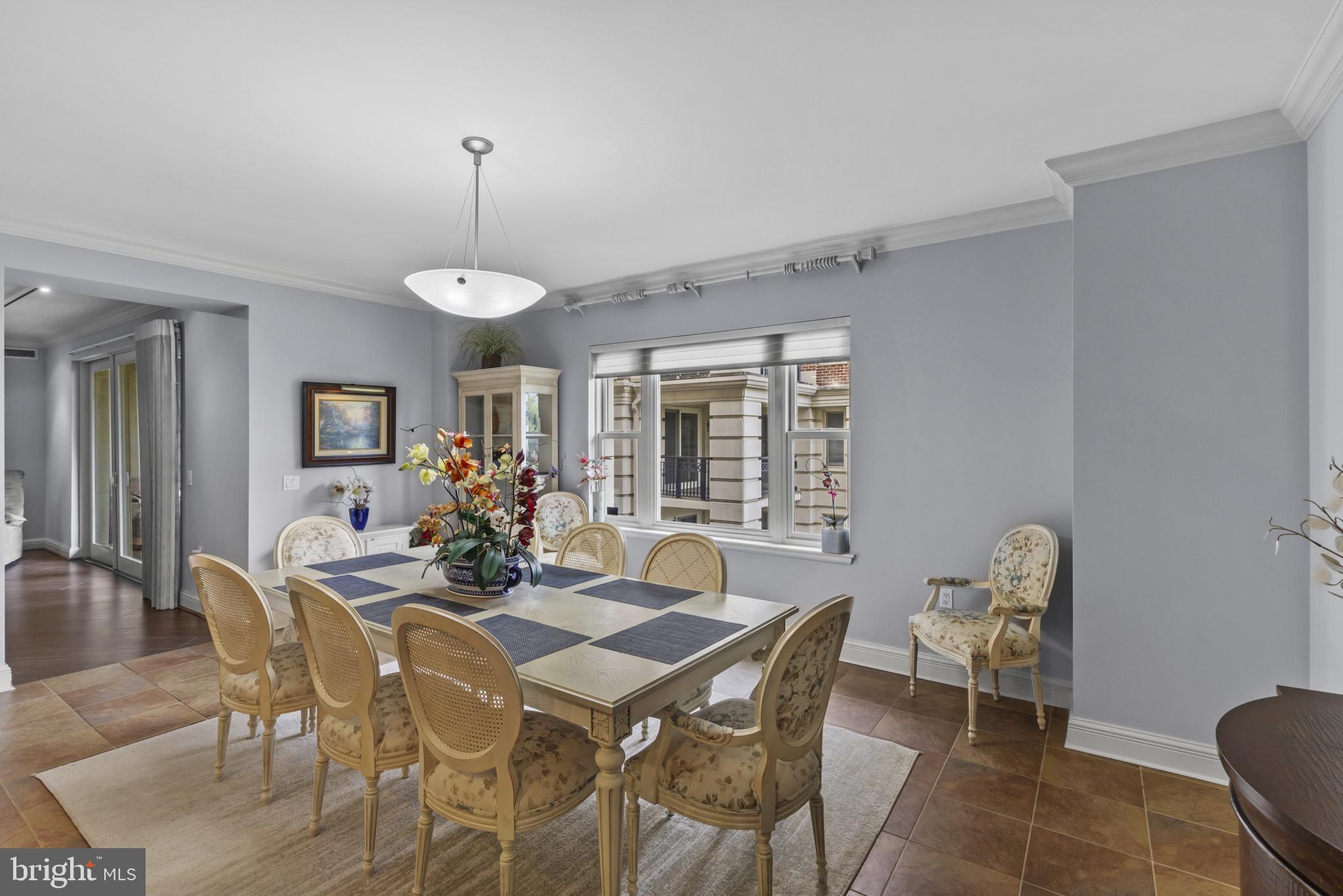 801 Key Highway, Unit 251 Baltimore, MD 21230 - Photo 10 of 57 a view of a dining room with furniture and window