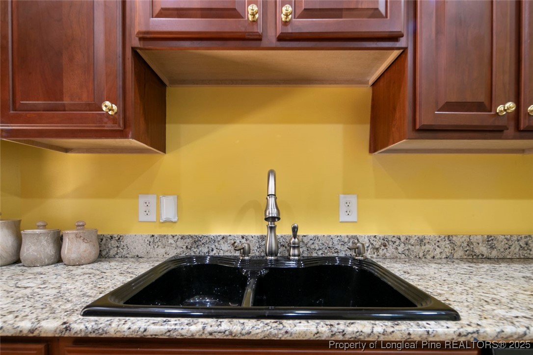 5304 Pineview Road Lumberton, NC 28360 - Photo 25 of 49 a kitchen with a sink and a stove