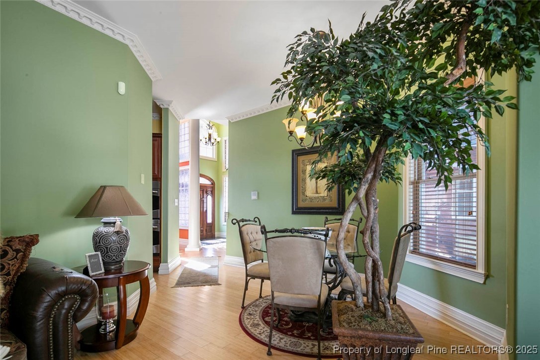 5304 Pineview Road Lumberton, NC 28360 - Photo 38 of 49 a view of a dining room with furniture and a potted plant