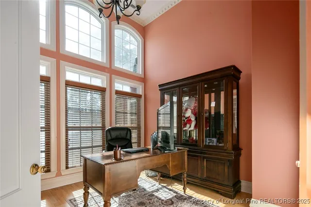 an aerial view of a house with outdoor space