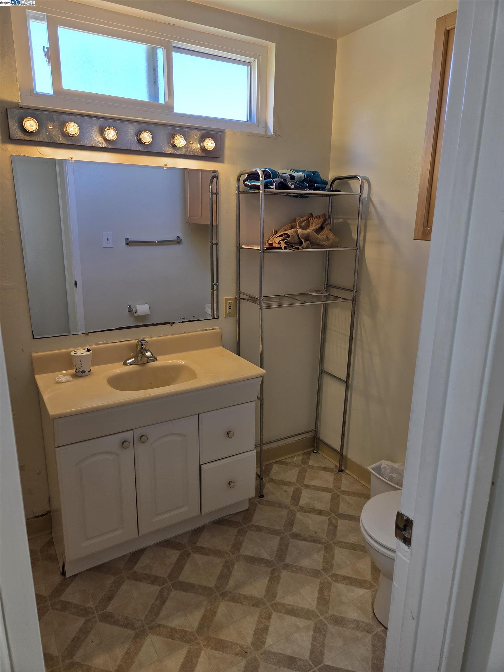 6198 Hancock Avenue San Jose, CA 95123 - Photo 14 of 27 a bathroom with a sink and a mirror