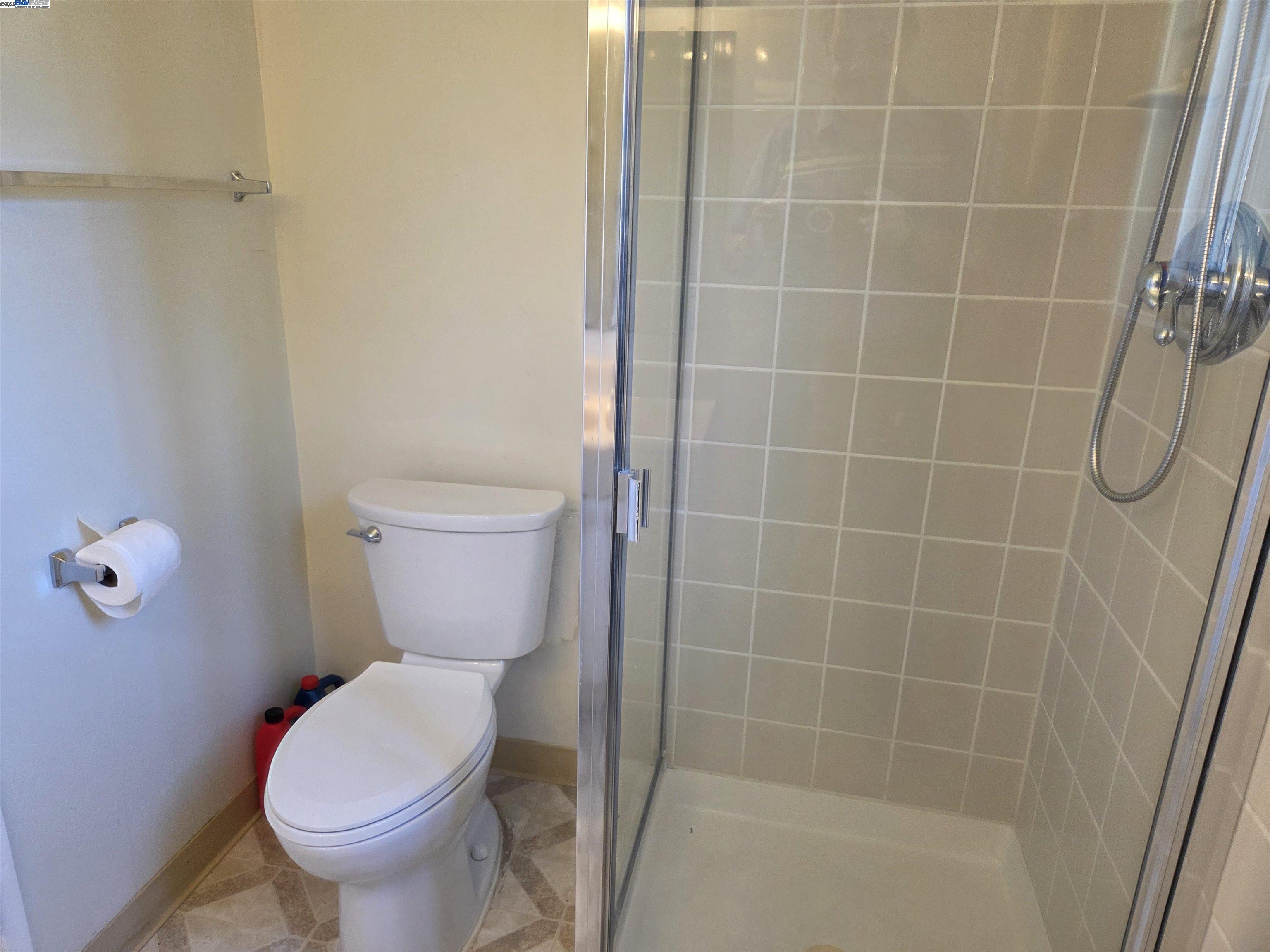 6198 Hancock Avenue San Jose, CA 95123 - Photo 21 of 27 a bathroom with a toilet and a shower