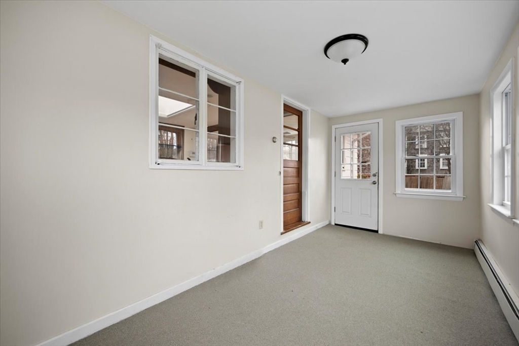 22 Rugdale Road Boston, MA 02124 - Photo 8 of 39 an empty room with windows
