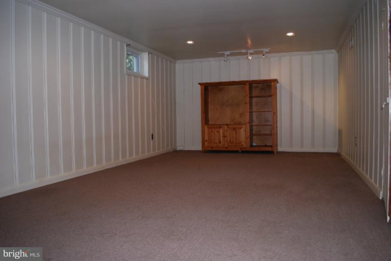 5573 Ashbourne Road Halethorpe, MD 21227 - Photo 14 of 30 a view of an empty room with closet area