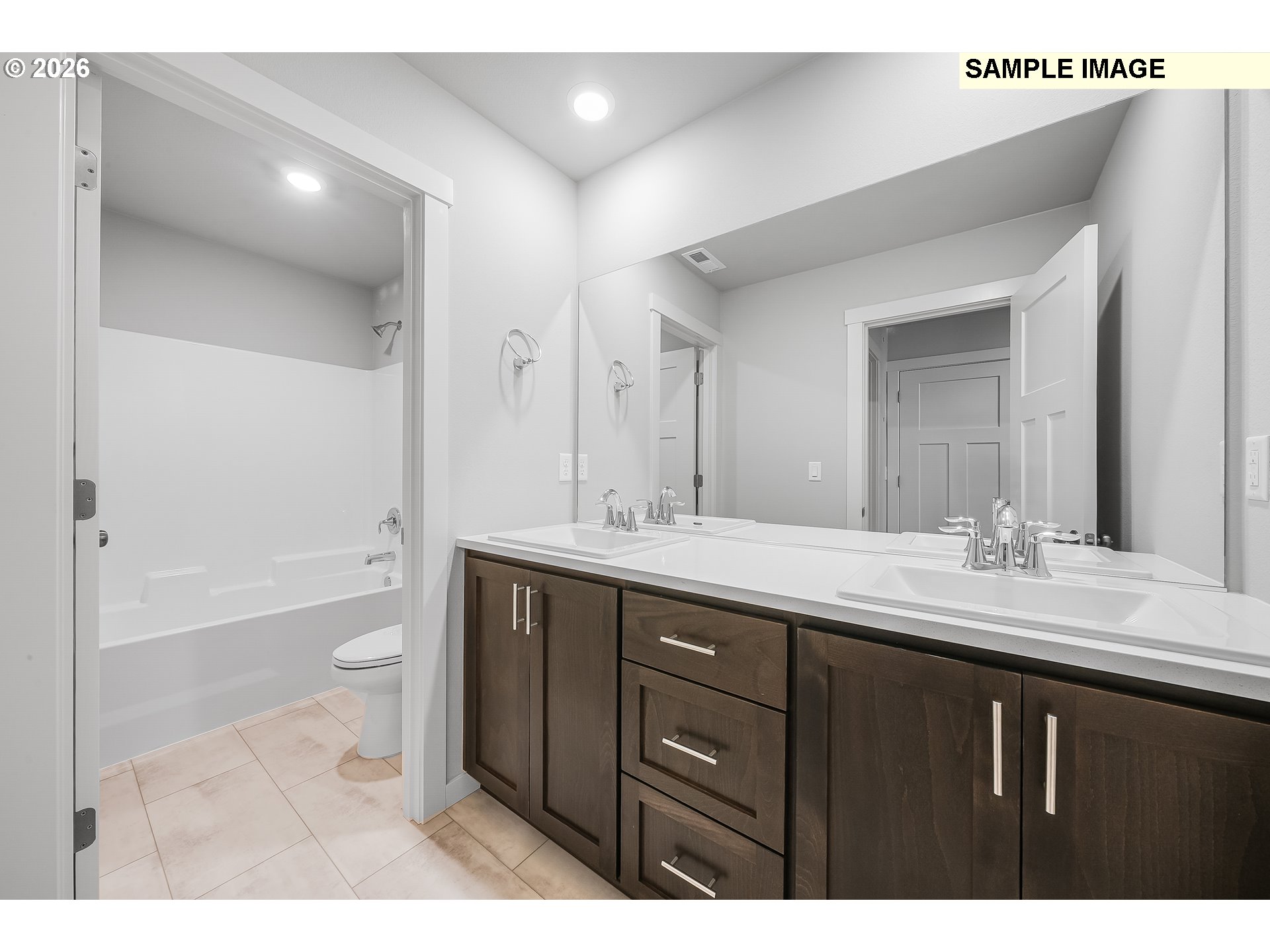 1091 Legacy Street Eugene, OR 97402 - Photo 14 of 18 a bathroom with a sink a toilet and a bathtub