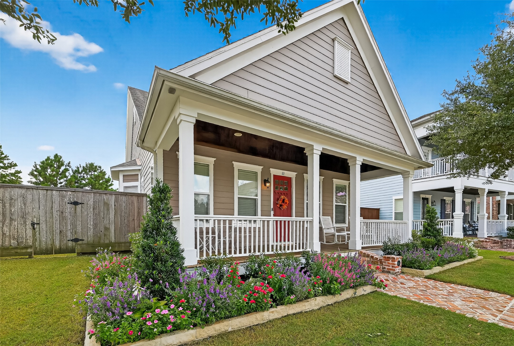 front view of a house with a yard
