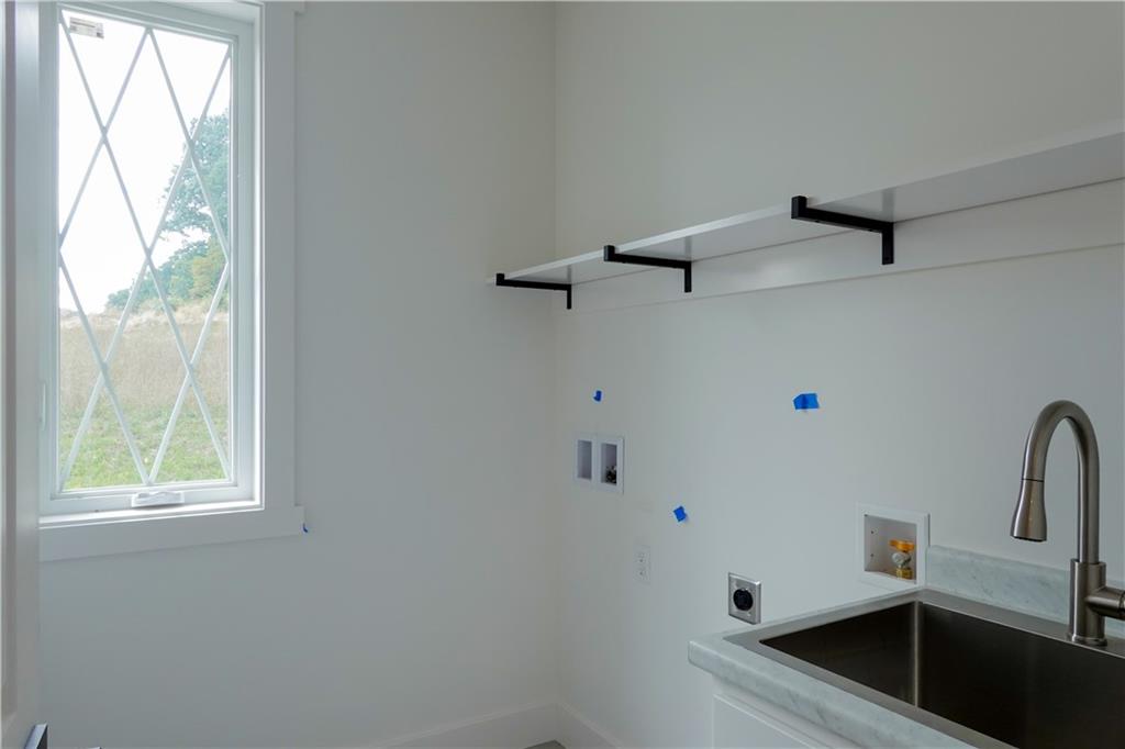 295 Hutchman Road Mars, PA 16046 - Photo 12 of 25 1st floor laundry room with stainless steel sink with cabinet and open shelf for storage!