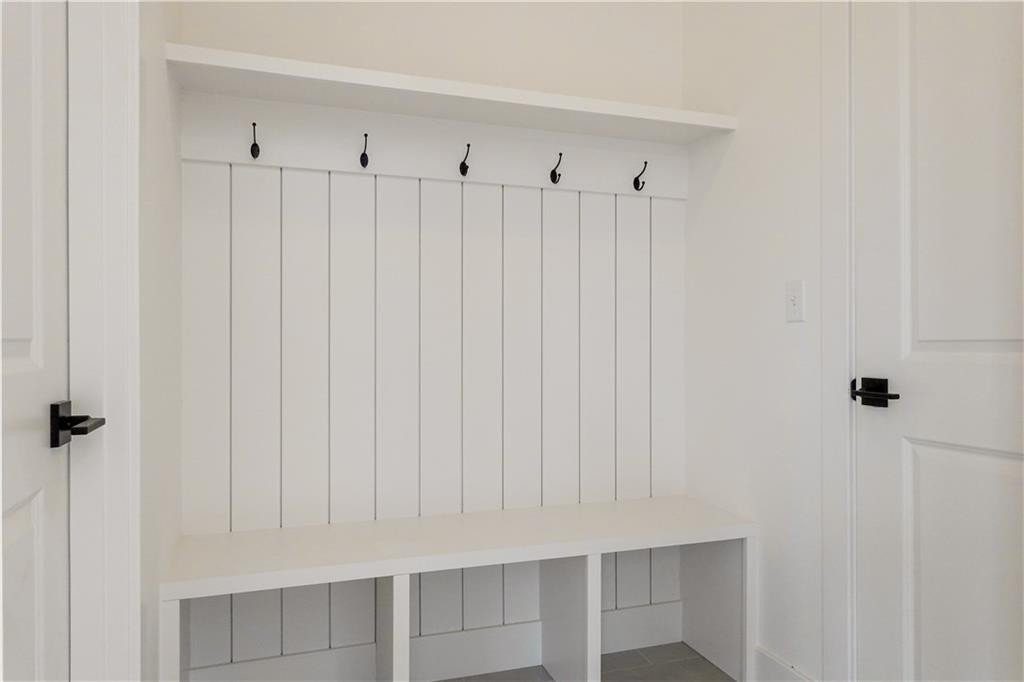 295 Hutchman Road Mars, PA 16046 - Photo 13 of 25 Custom designed shiplap mudroom! Bench, space for shoes, hooks for coats and bags and a shelf to hold additional belongings!
